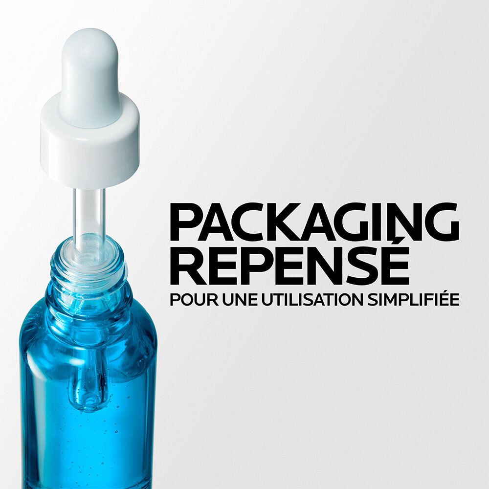 Flacon de sérum bleu avec pipette. Texte: PACKAGING REPENSE POUR UNE UTILISATION SIMPLIFIÉE.