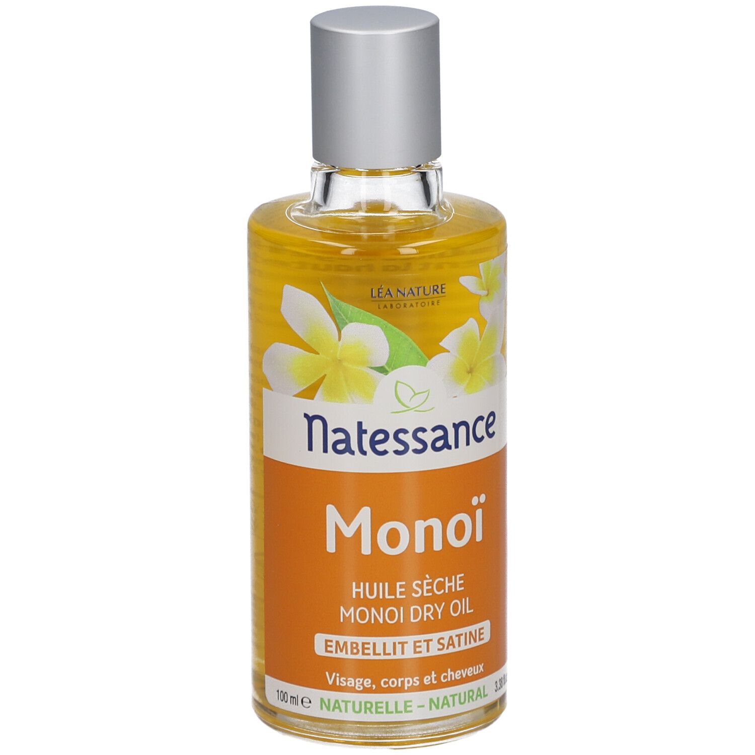 Flacon d'huile sèche Monoï Natessance. Étiquette orange avec fleurs blanches. Bouchon argenté.