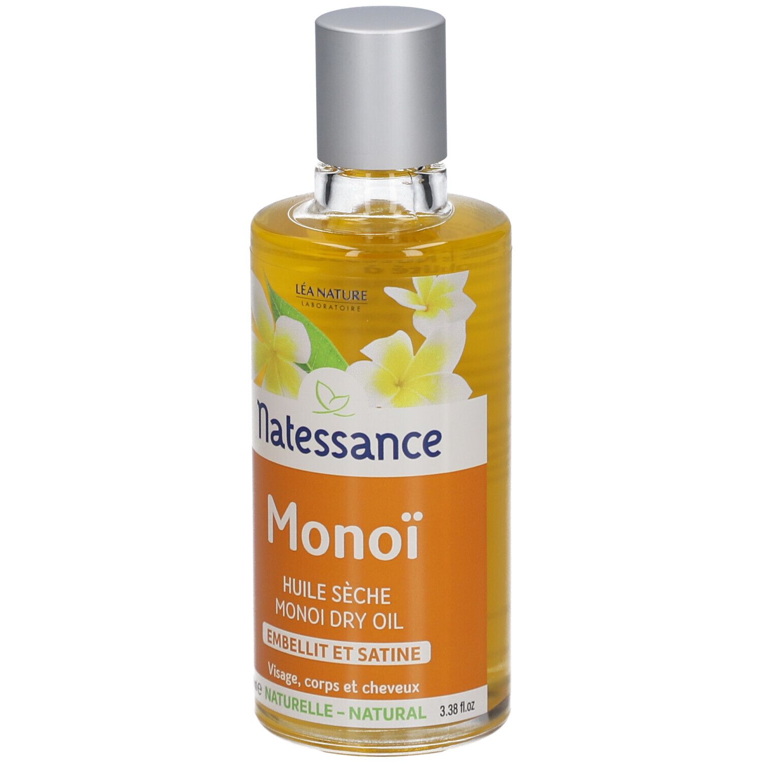 Flacon d'huile sèche Monoï Natessance. Étiquette orange avec fleurs blanches. Bouchon argenté.
