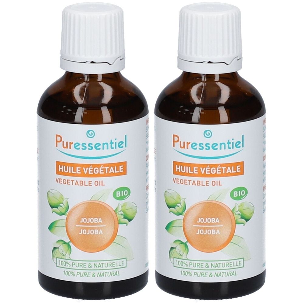 Deux flacons en verre brun avec bouchon blanc. Étiquette avec nom du produit, label « BIO » et inscription « Jojoba ».