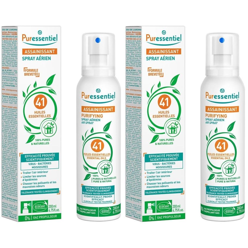Plusieurs flacons et boîtes de Puressentiel Spray aérien assainissant. Flacons blancs avec vaporisateur et emballage vert.