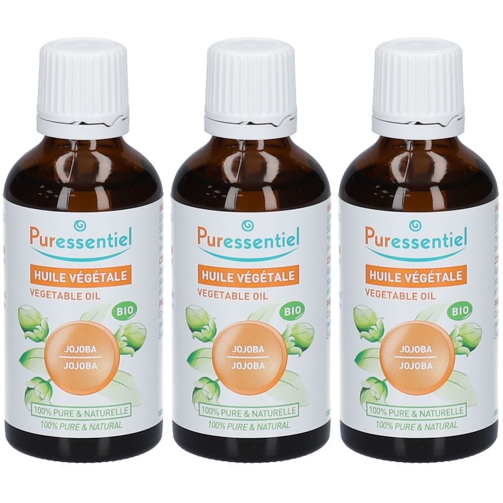 Trois flacons en verre brun avec bouchons blancs. Étiquettes avec "Puressentiel", "Huile Végétale Jojoba" et "BIO".