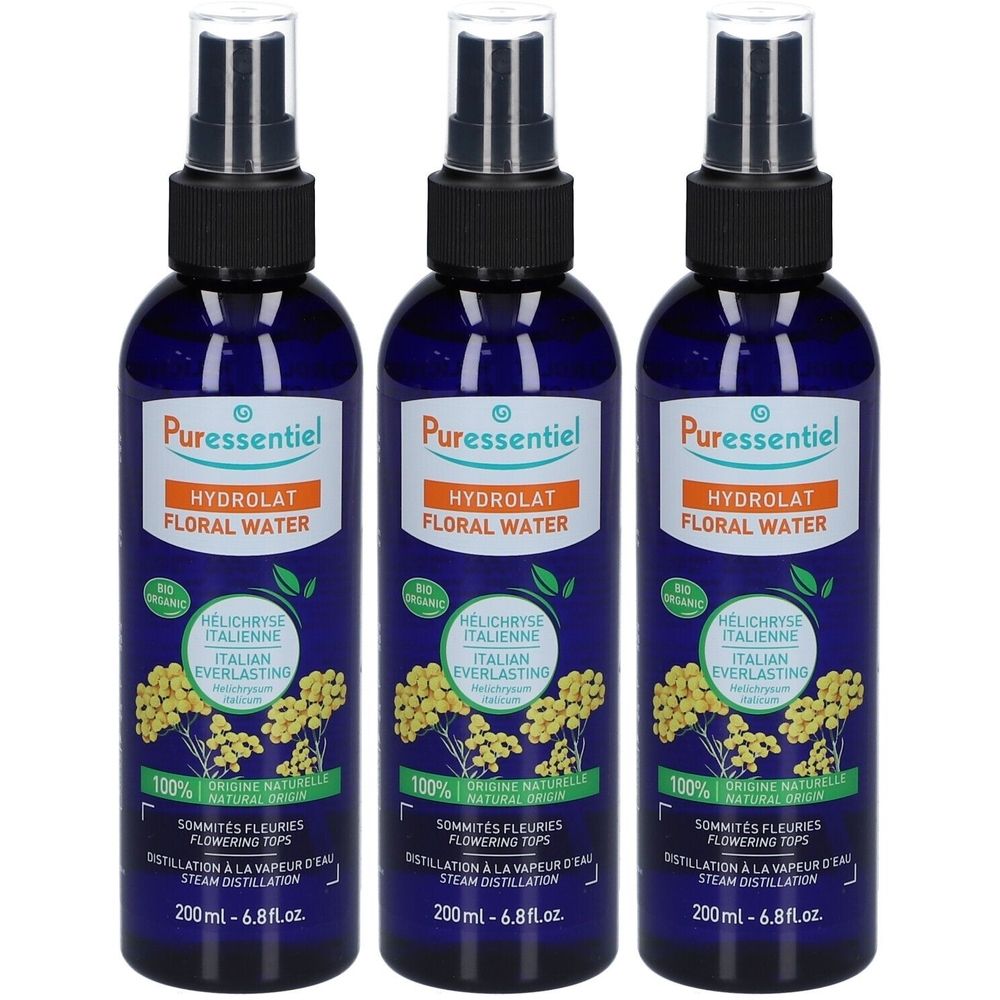 Trois flacons pulvérisateurs bleus avec bouchons noirs. Étiquettes : "Puressentiel Hydrolat Floral Water".