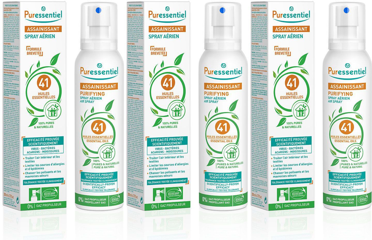 Plusieurs sprays et boîtes. Inscription: Puressentiel, Spray Aérien, 41 Huiles Essentielles. Design vert et orange.