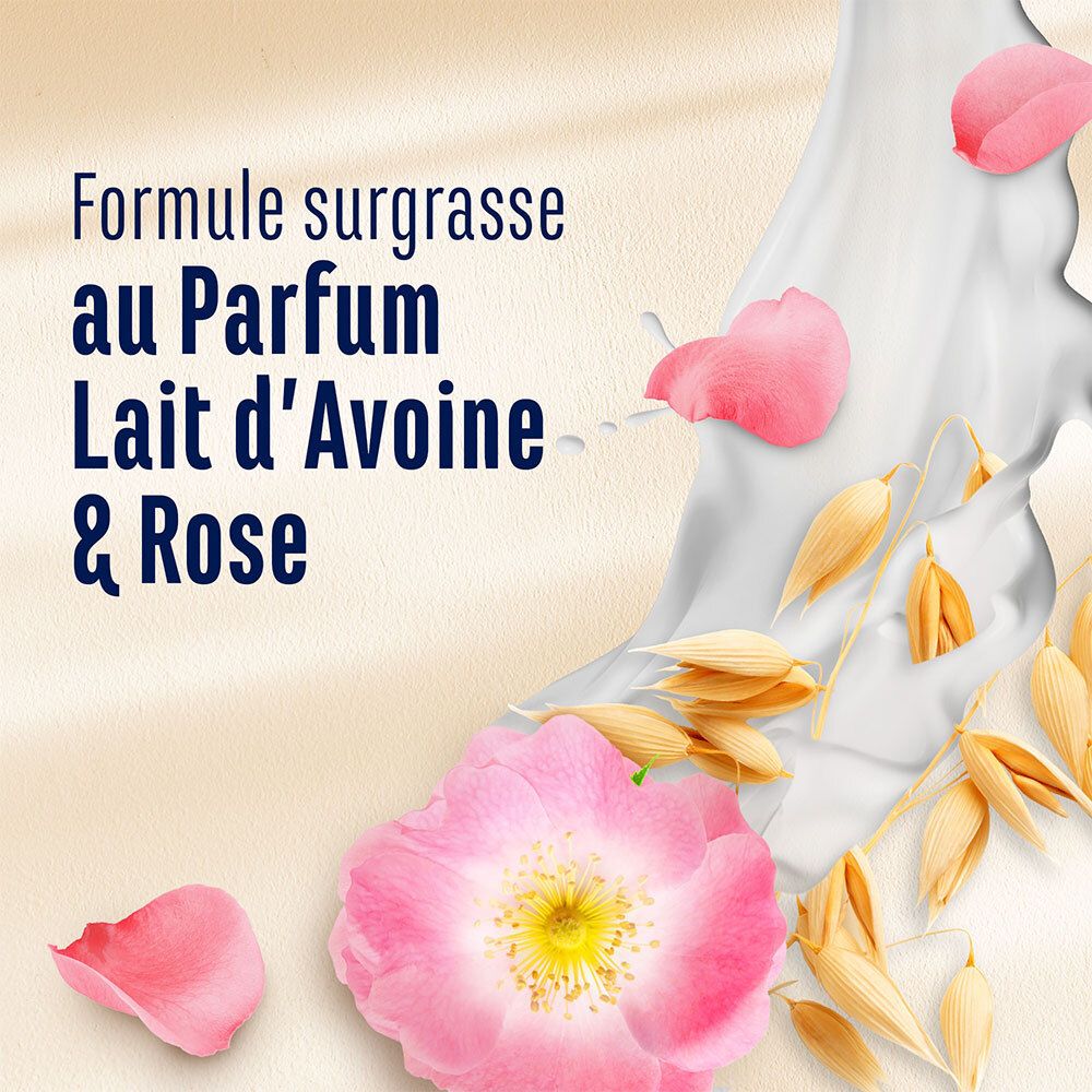 Flacon avec texte: Le Petit Marseillais, Le Rituel Douceur, Soin douche surgras. Décor: rose, avoine, liquide.