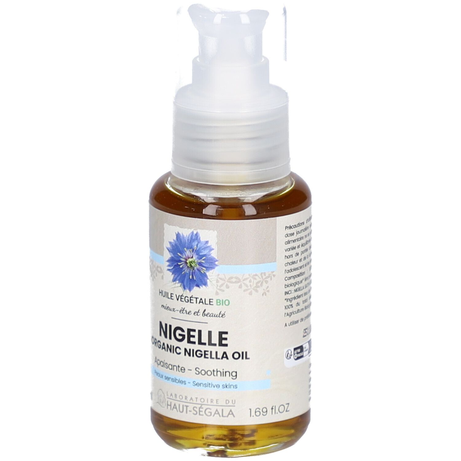 Flacon de liquide brun avec pompe. Inscription: Nigelle Organic Nigella Oil. Label: Laboratoire du Haut-Ségala.