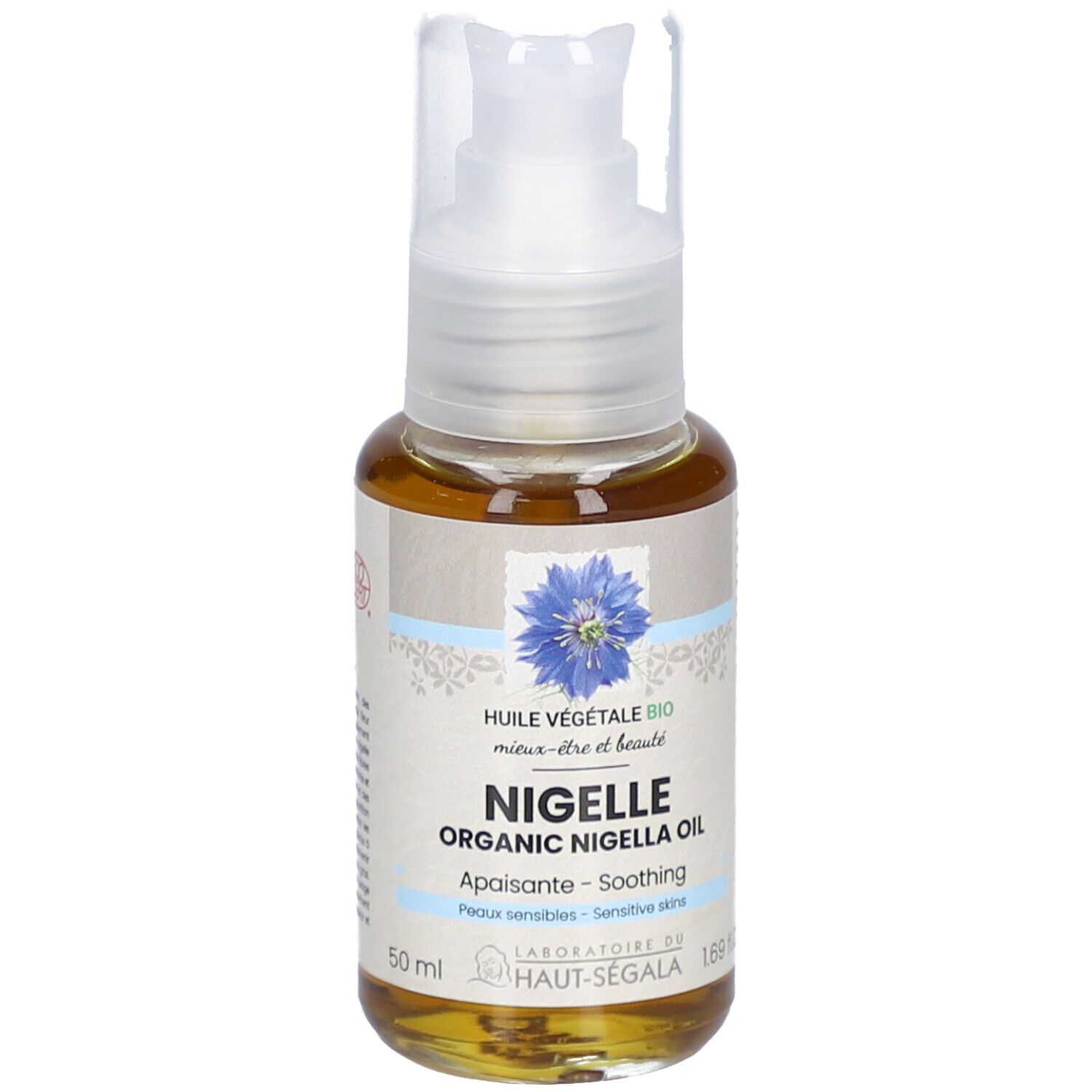 Flacon de liquide brun avec pompe. Inscription: Nigelle Organic Nigella Oil. Label: Laboratoire du Haut-Ségala.