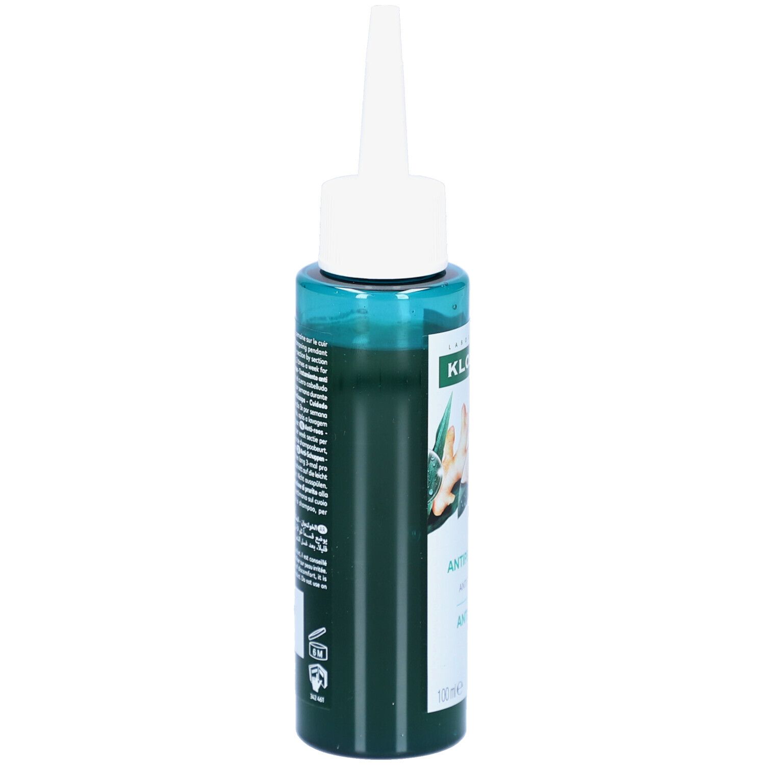 Flacon vert avec applicateur blanc. Inscriptions: KLORANE, Antipelliculaire, Anti-Démangeaisons, Anti-Dandruff Treatment. Texte au dos.