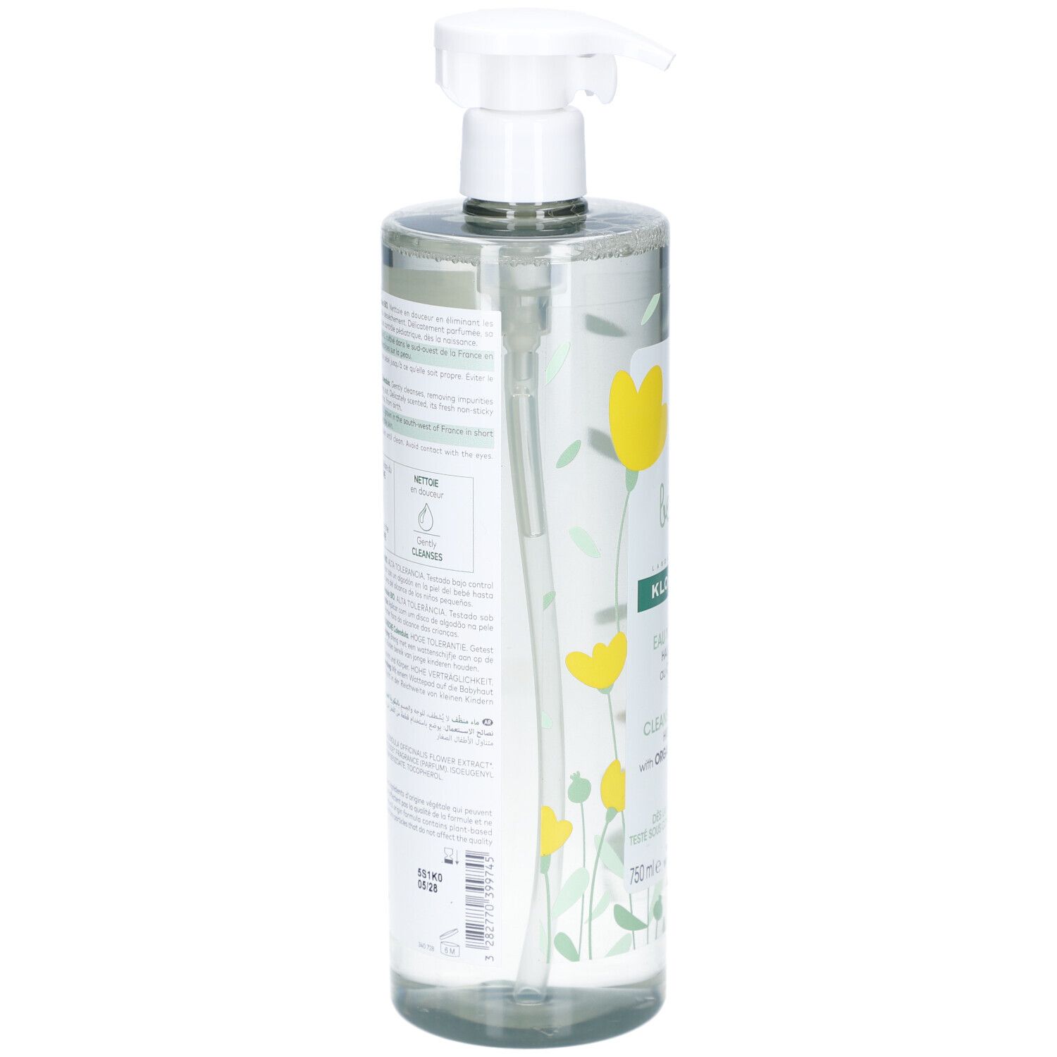 Flacon transparent avec pompe. Inscriptions et texte sur l'étiquette. Illustrations de fleurs jaunes. Dos avec texte.