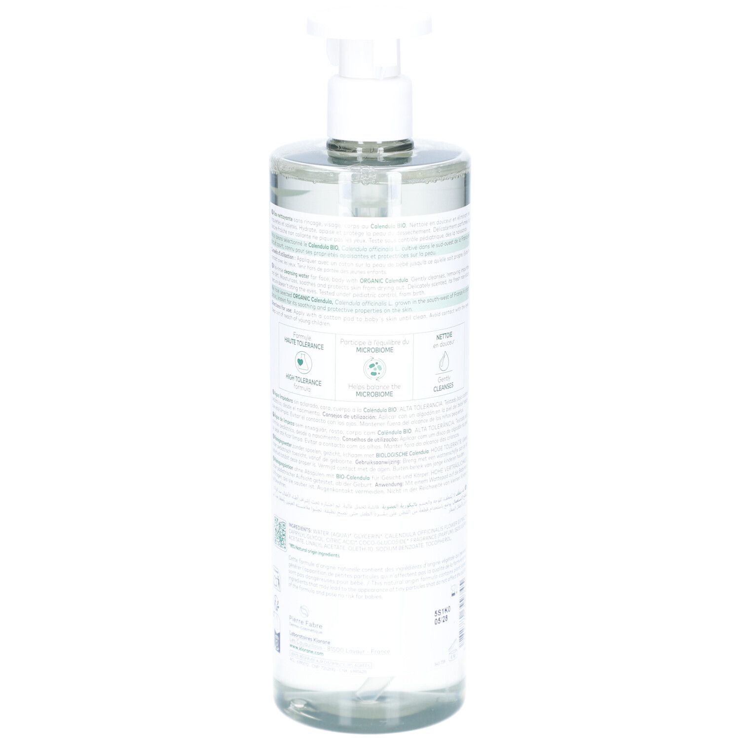 Flacon transparent avec pompe. Dos avec texte. Inscription: Klorane Bébé. Étiquette avec informations et symboles.