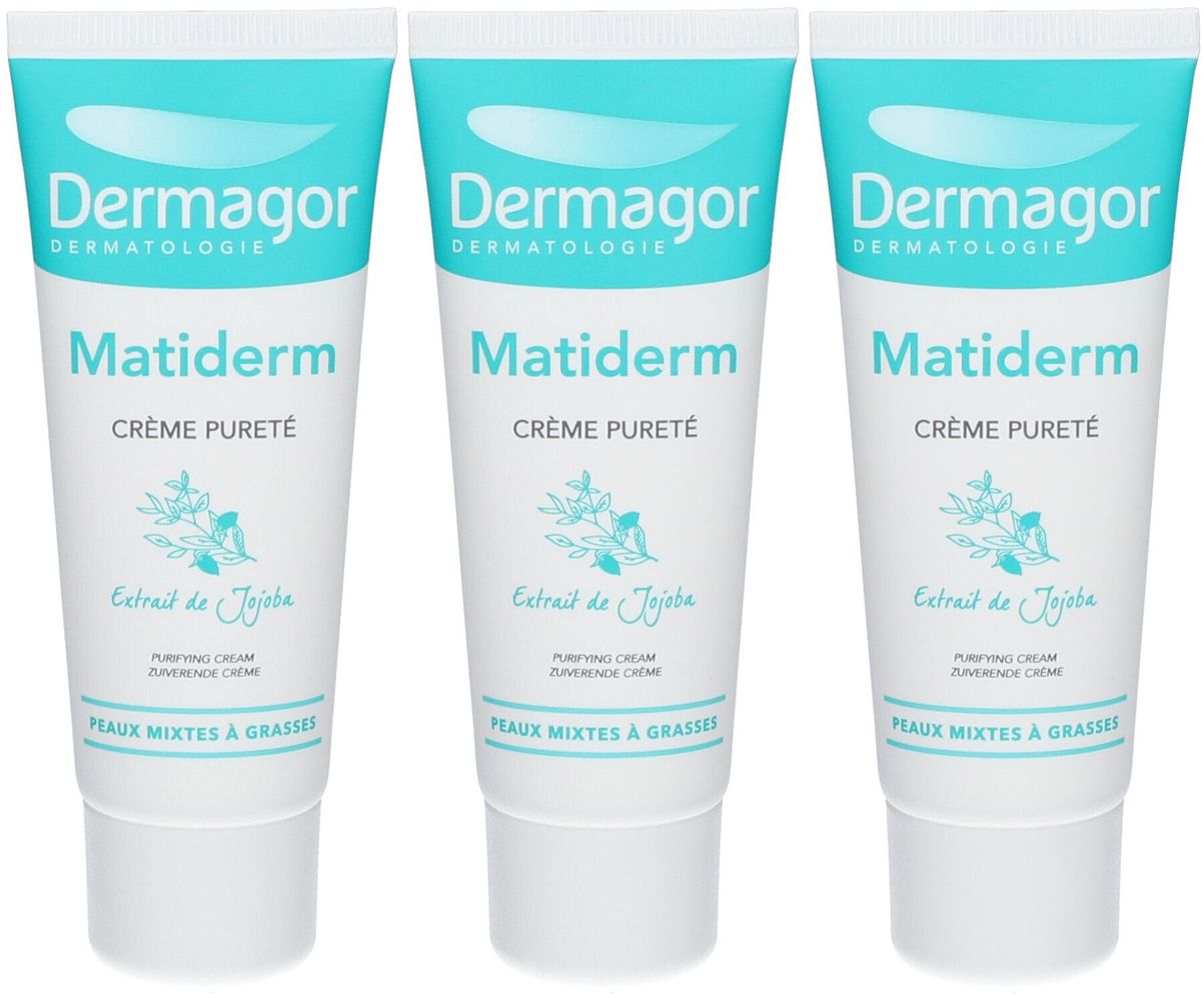 Trois tubes de crème nettoyante Dermagor Matiderm. Emballage blanc et turquoise. Inscription : Matiderm, Crème Pureté, Extrait de Jojoba, Peaux mixtes à grasses.