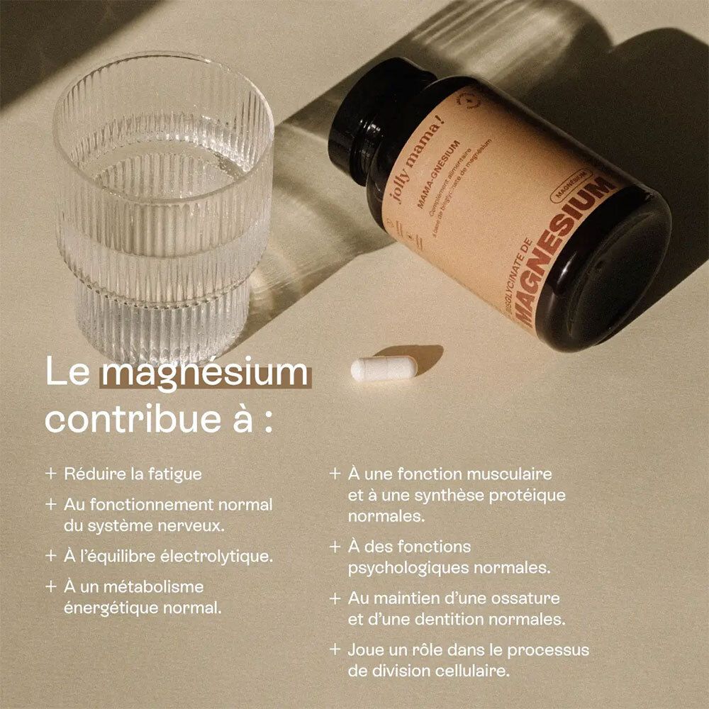 Verre d'eau, gélule et flacon. Inscription: Le magnésium contribue à. Texte sur les bienfaits du magnésium.
