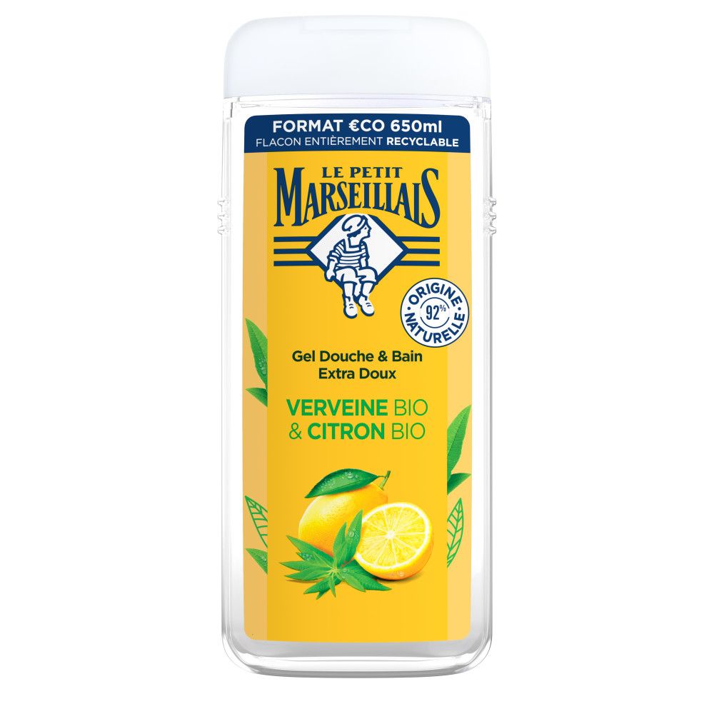 Flacon de gel douche avec étiquette jaune. Inscription: LE PETIT MARSEILLAIS, Verveine BIO & Citron BIO. Avec citron et feuilles.