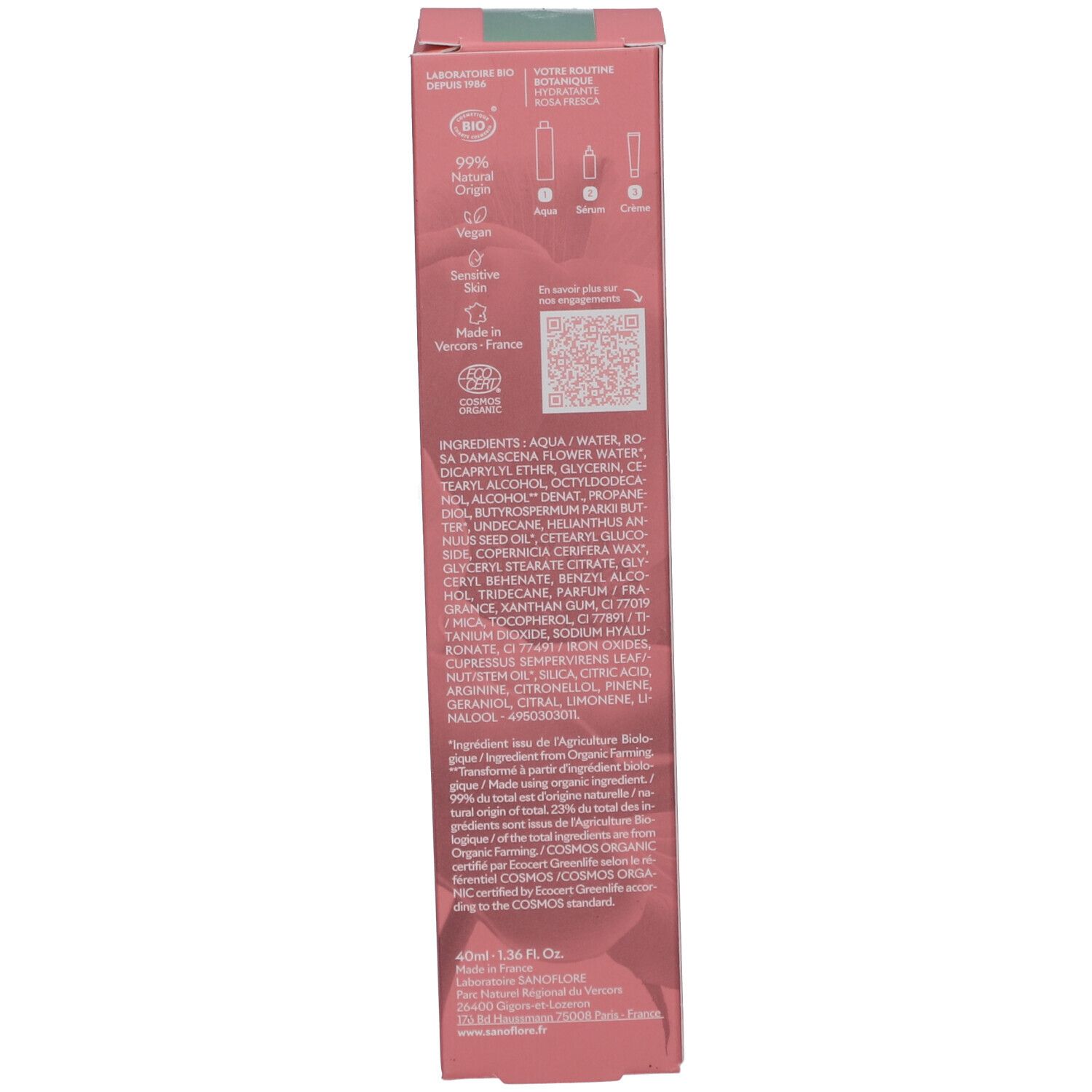 Côté de la boîte de crème Rosa Fresca. Rose, avec des accents verts. Ingrédients, label bio, informations d'origine, code QR.