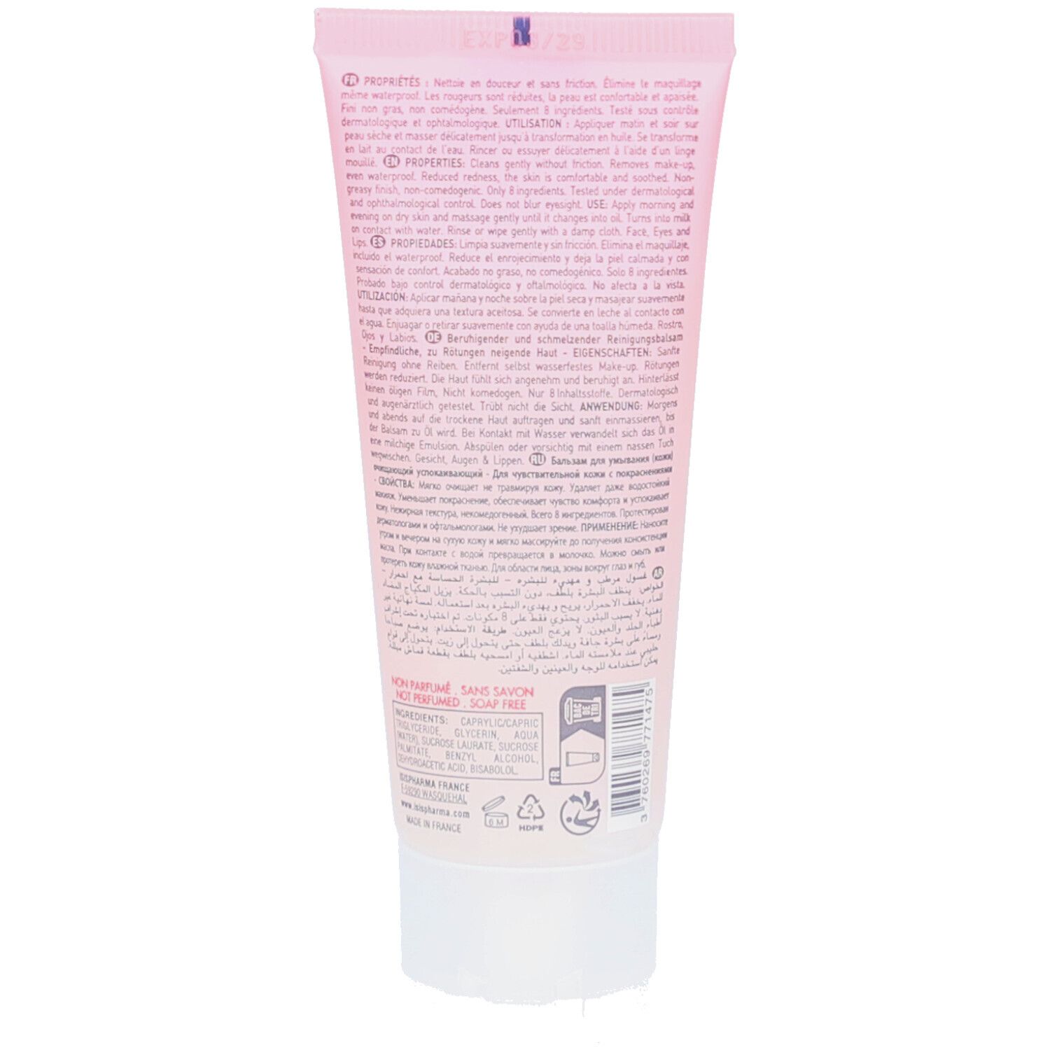 Dos d'un tube rose avec bouchon blanc. Texte multilingue. Informations et symboles.