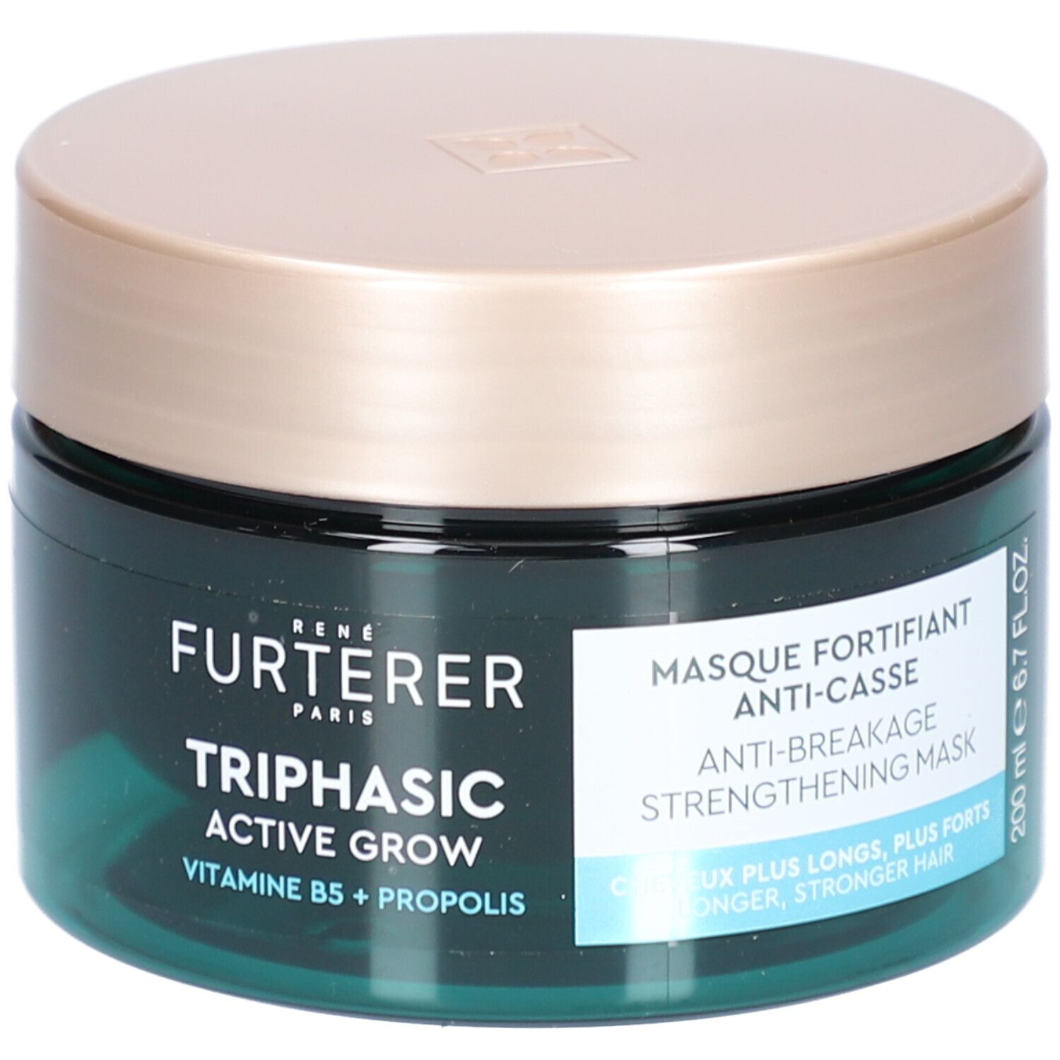 Pot rond avec couvercle doré. Inscription : FURTERER PARIS, Triphasic Active Grow, Vitamine B5 + Propolis. Texte : Masque Fortifiant Anti-Casse.