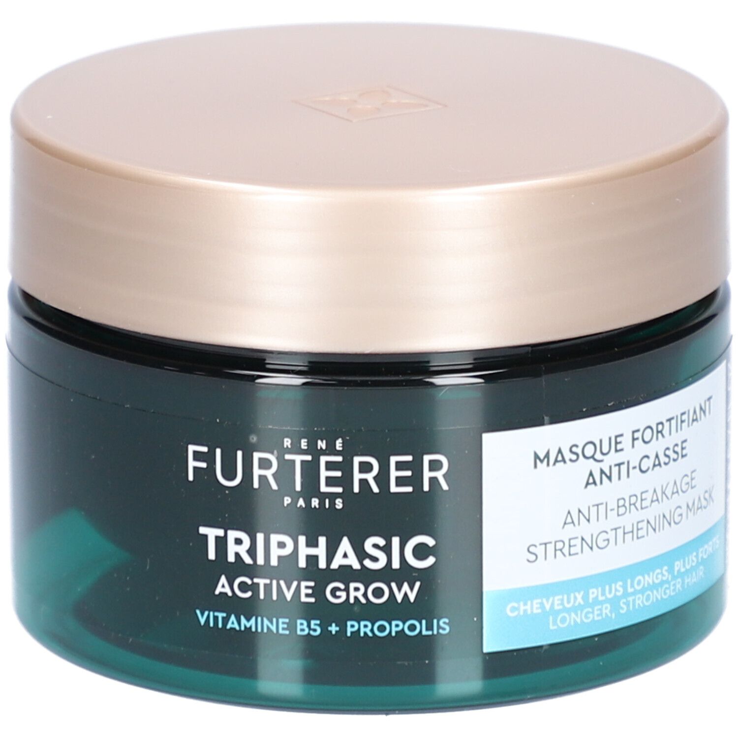 Pot rond avec couvercle doré. Inscription : FURTERER PARIS, Triphasic Active Grow, Vitamine B5 + Propolis. Texte : Masque Fortifiant Anti-Casse.