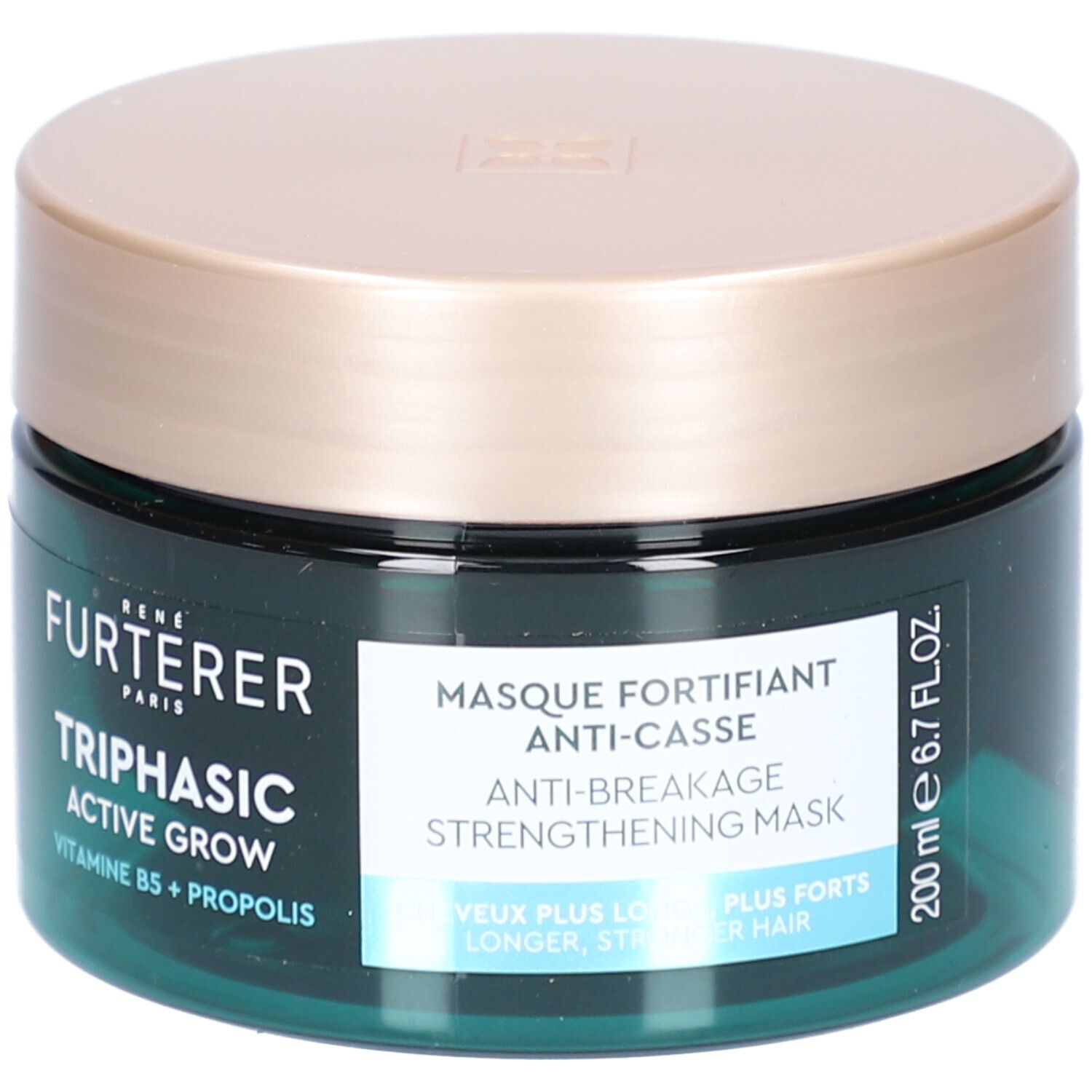 Pot rond avec couvercle doré. Inscription : FURTERER PARIS, Triphasic Active Grow, Vitamine B5 + Propolis. Texte : Masque Fortifiant Anti-Casse. 200 ml.