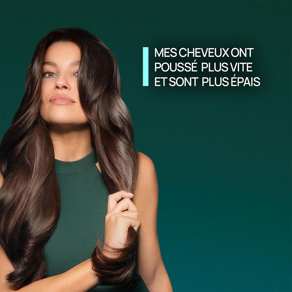 Femme aux cheveux longs. Texte: Mes cheveux ont poussé plus vite et sont plus épais.