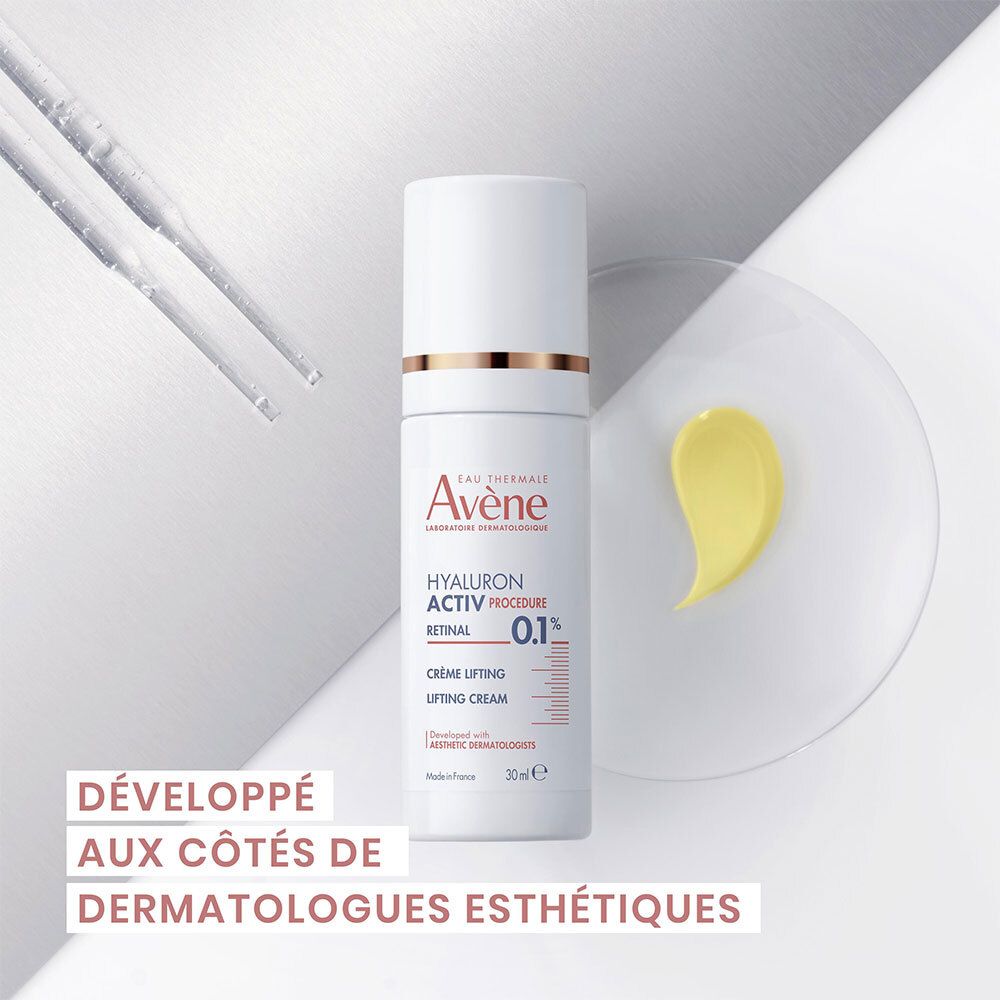Flacon pompe AVENE Hyaluron Activ Crème Lifting à côté d'une touche de crème, développé avec des dermatologues.