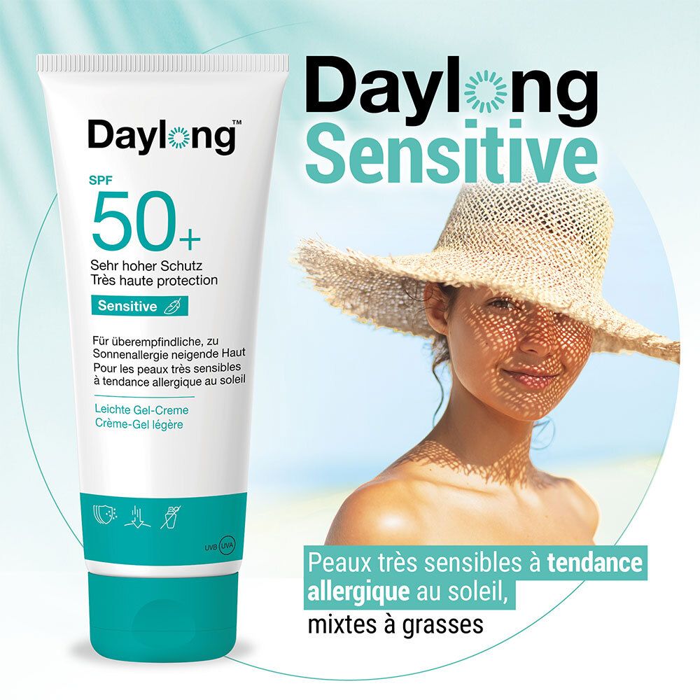 Publicité Daylong Sensitive. Femme avec chapeau. Tube et texte: SPF 50+, Sensitive. Peaux très sensibles, mixtes à grasses.
