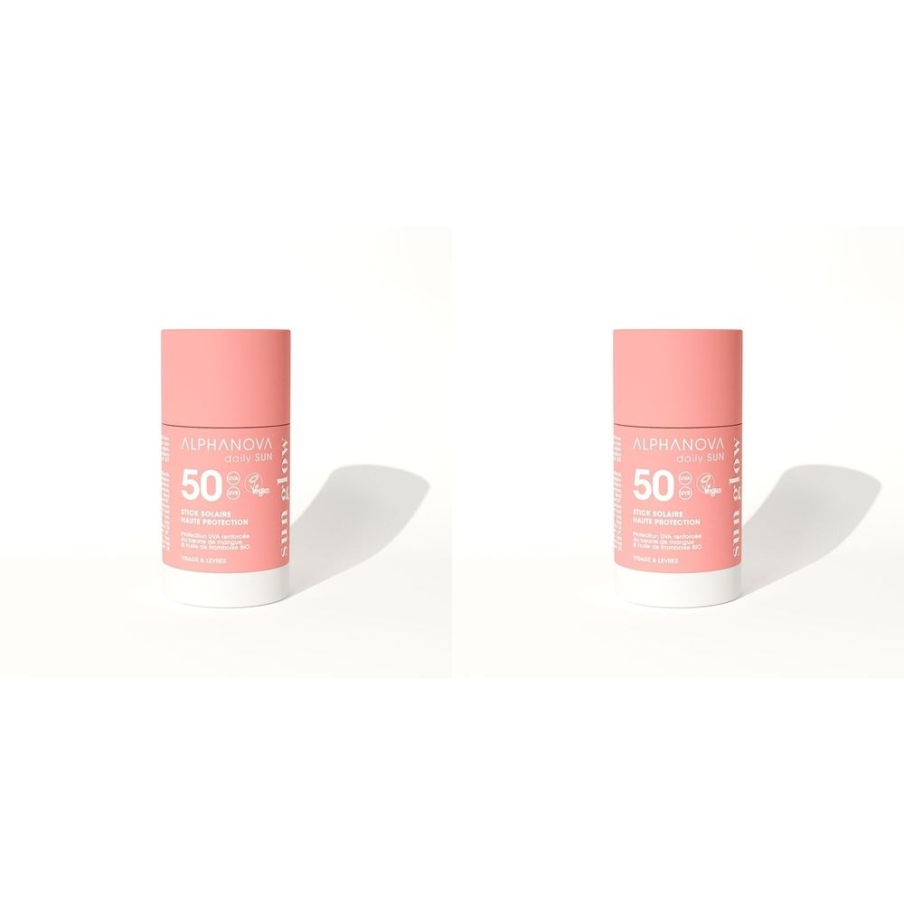Deux sticks solaires rose et blanc. Inscription: Alphanova, SPF 50.