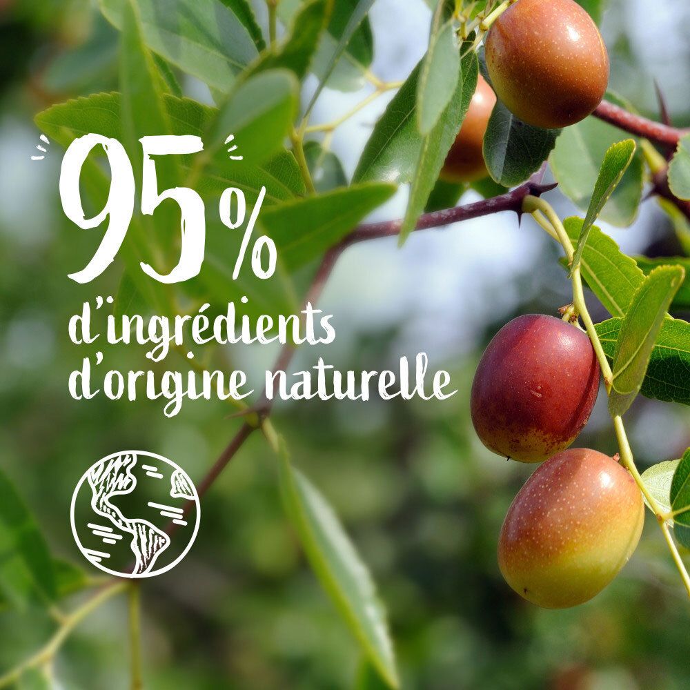 Noix de jojoba et feuilles avec indication '95% d'ingrédients d'origine naturelle'.