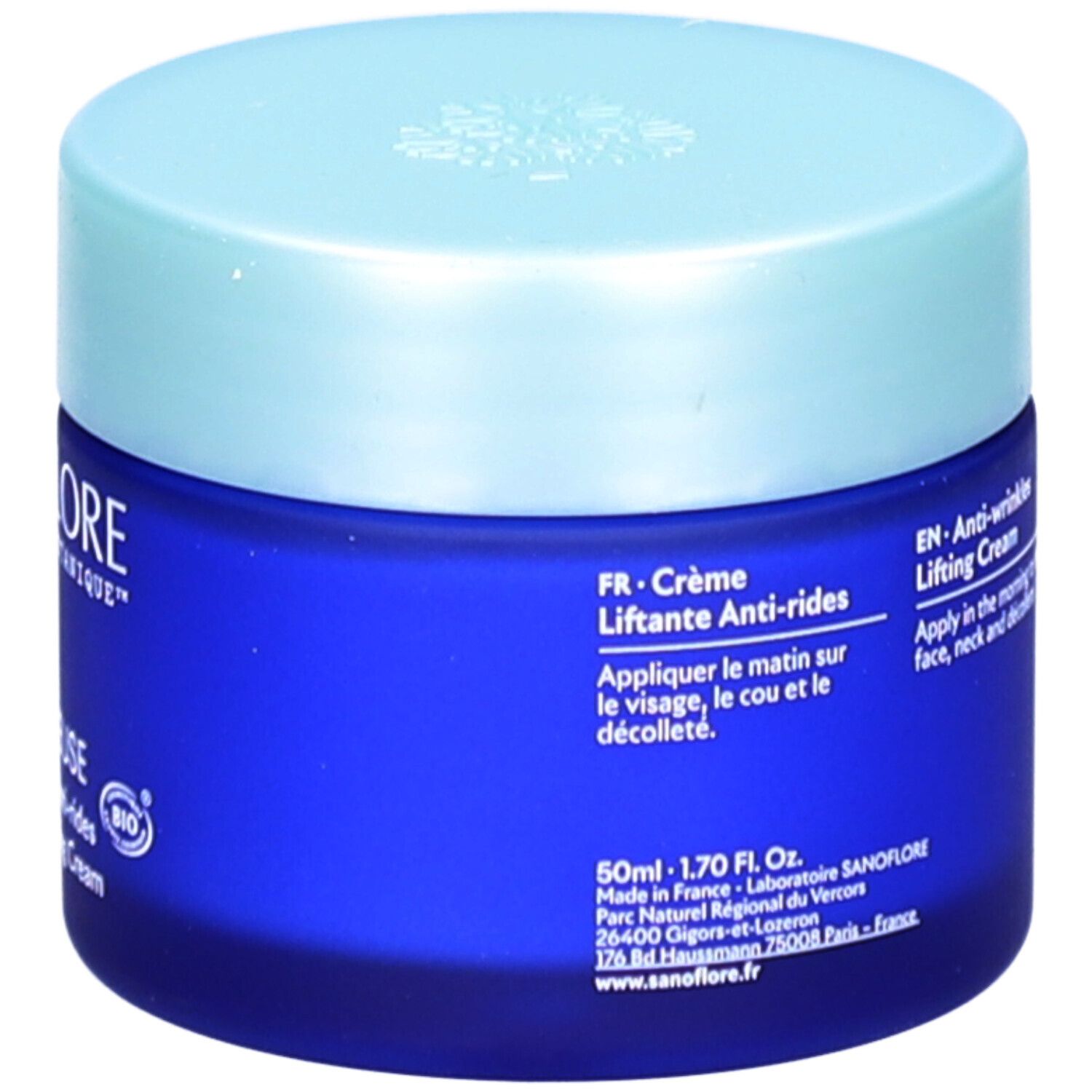 Pot de crème bleu avec couvercle clair. Texte multilingue au dos. Contient le label COSMOS ORGANIC.