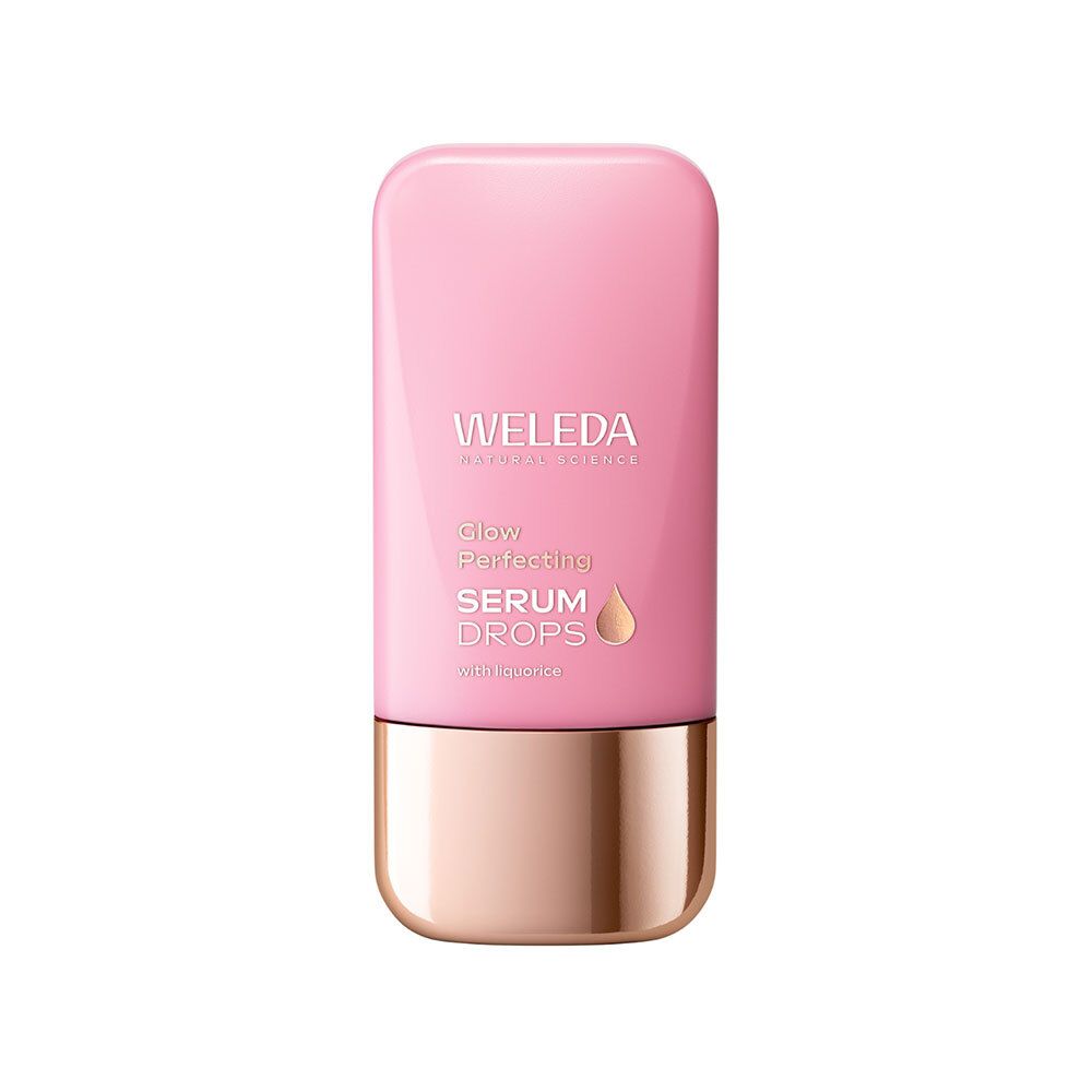 Flacon rose avec base dorée. Logo WELEDA et nom du produit Glow Perfecting Serum Drops.