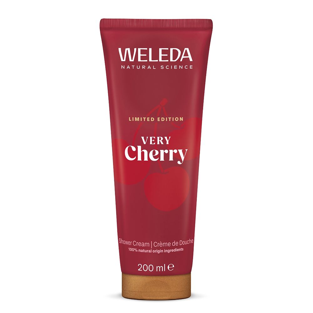 Tube rouge avec texte WELEDA, Very Cherry et illustration de cerises. Fermeture dorée. Crème de Douche.