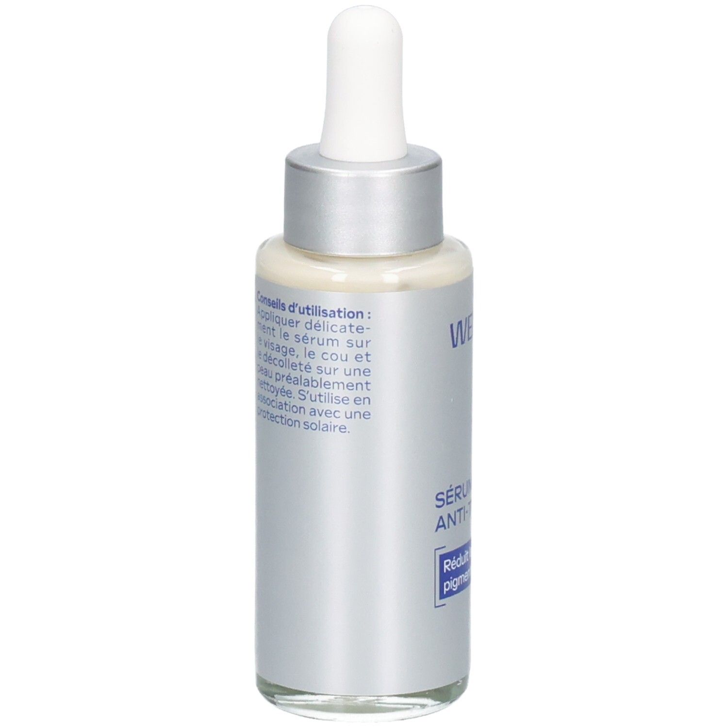 Flacon argenté avec bouchon blanc et pipette. Inscription : WELEDA, Sérum éclat anti-taches. Dos avec mode d'emploi.