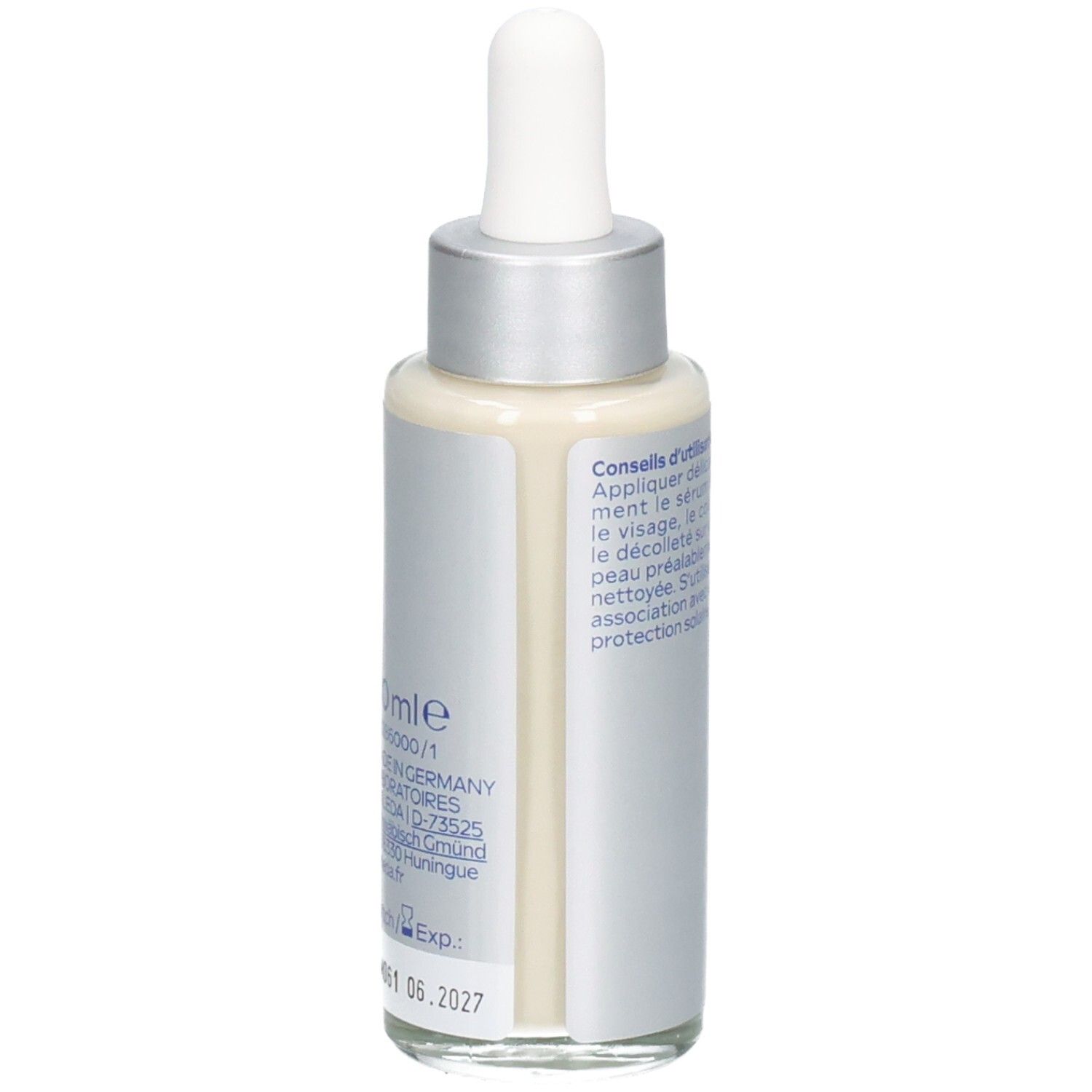 Flacon argenté avec bouchon blanc et pipette. Informations au dos. Inscription : 30 ml, Exp.: 01.06.2027.