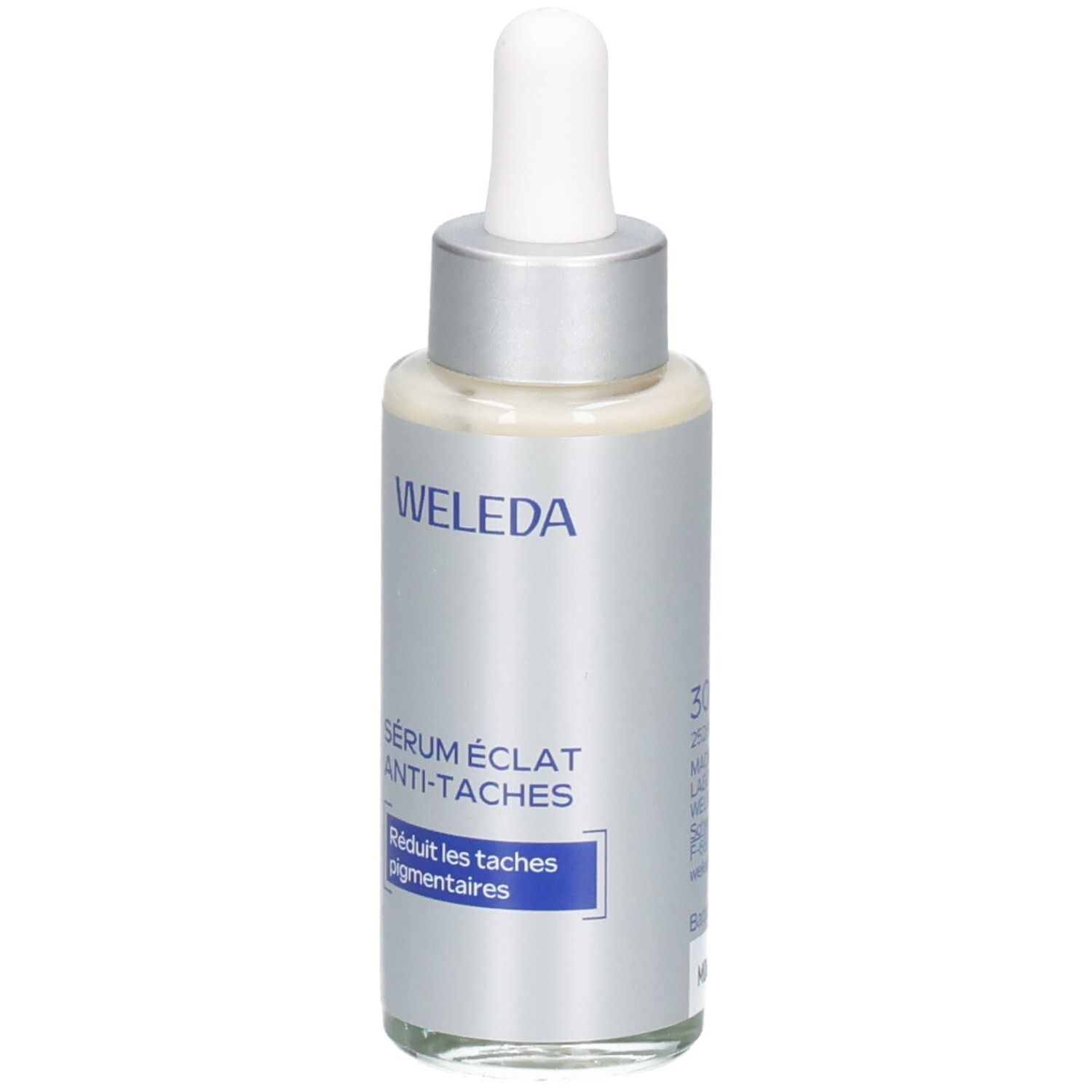 Flacon argenté avec bouchon blanc et pipette. Inscription : WELEDA, Sérum éclat anti-taches. Texte bleu : Réduit les taches pigmentaires.
