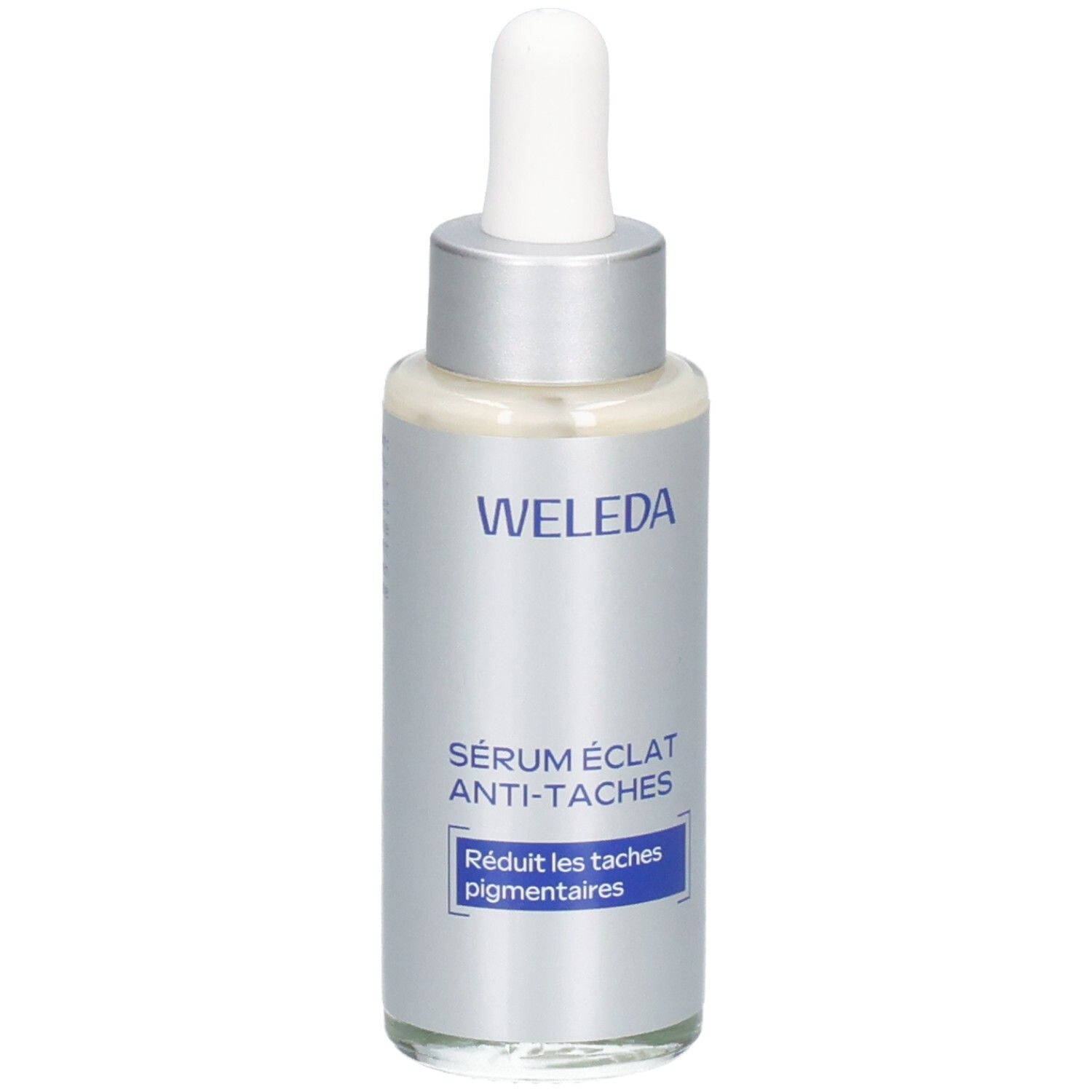 Flacon argenté avec bouchon blanc et pipette. Inscription : WELEDA, Sérum éclat anti-taches. Texte bleu : Réduit les taches pigmentaires.