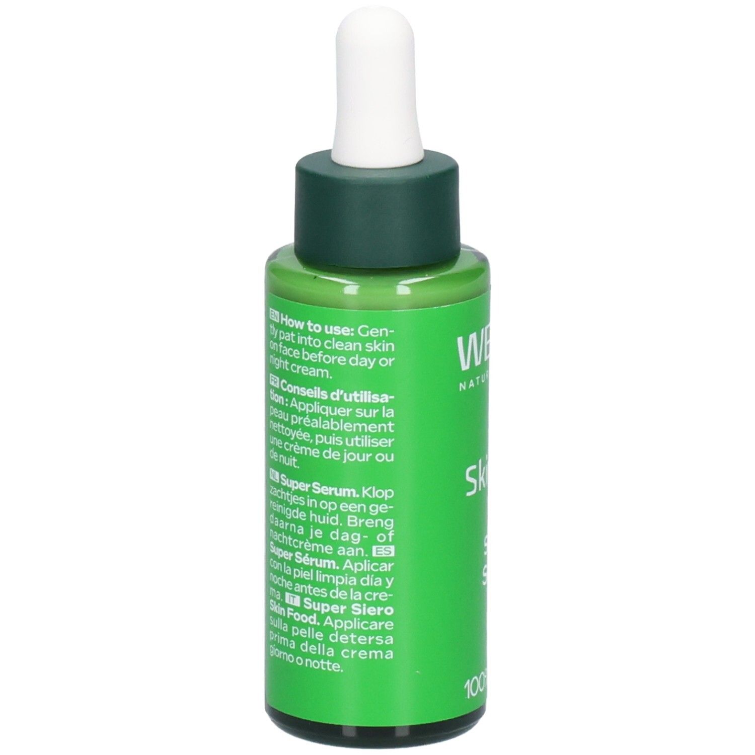 Flacon vert avec compte-gouttes blanc. Inscription: WELEDA, Skin Food Super Serum. Texte multilingue.