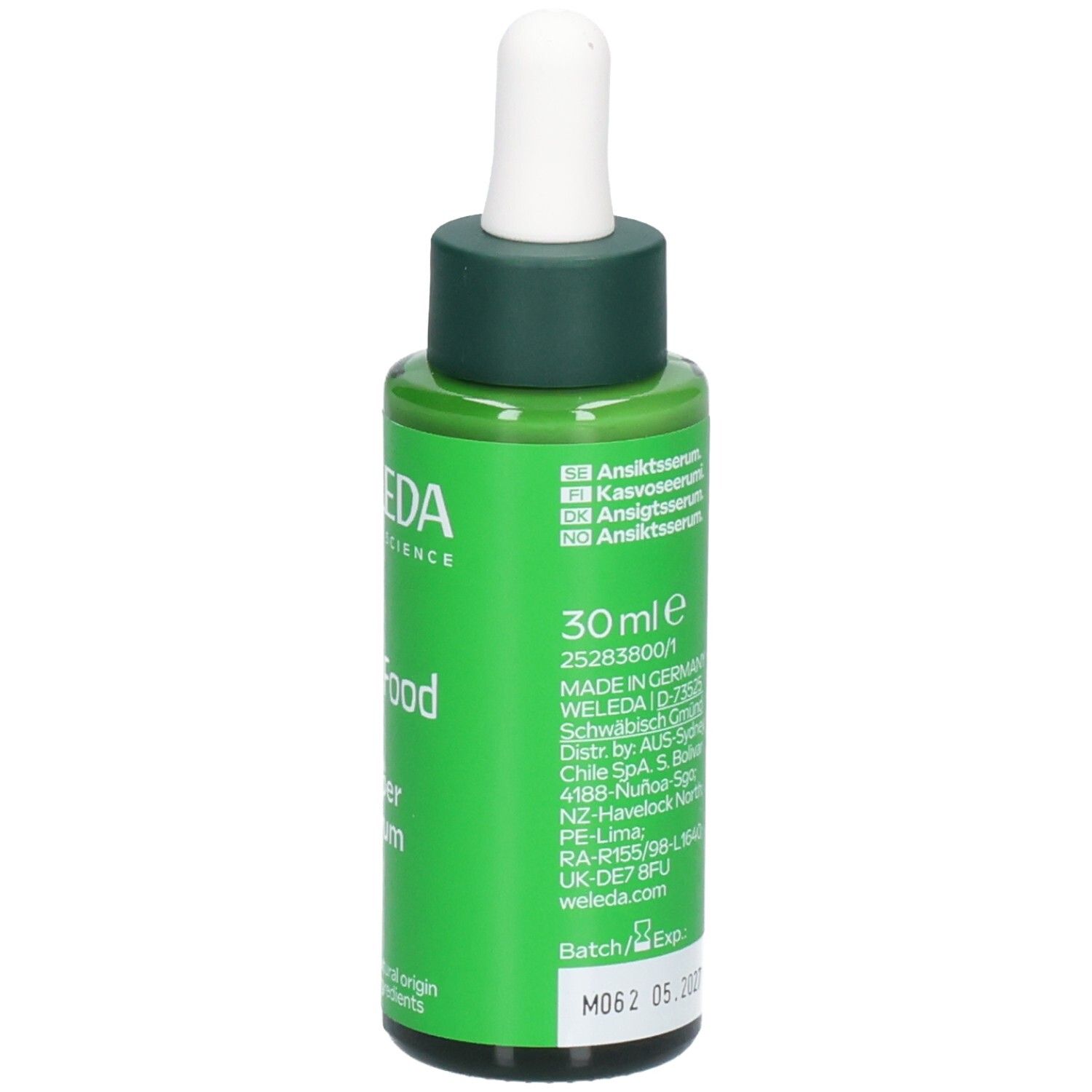 Flacon vert avec compte-gouttes blanc. Inscription: WELEDA, Skin Food Super Serum. 30 ml. Lieu de fabrication.