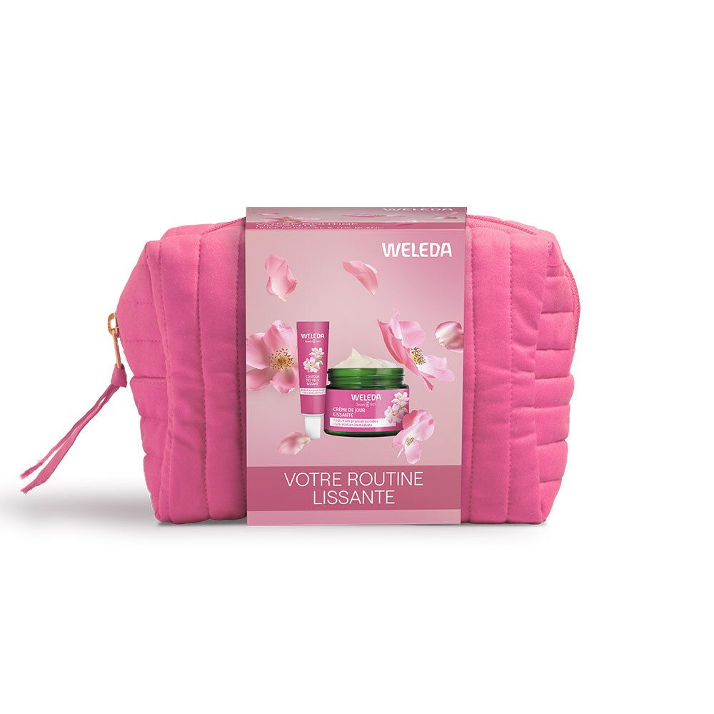 Trousse de toilette rose avec produits. Inscription: WELEDA, Votre Routine Lissante. Contient crème et baume à lèvres.