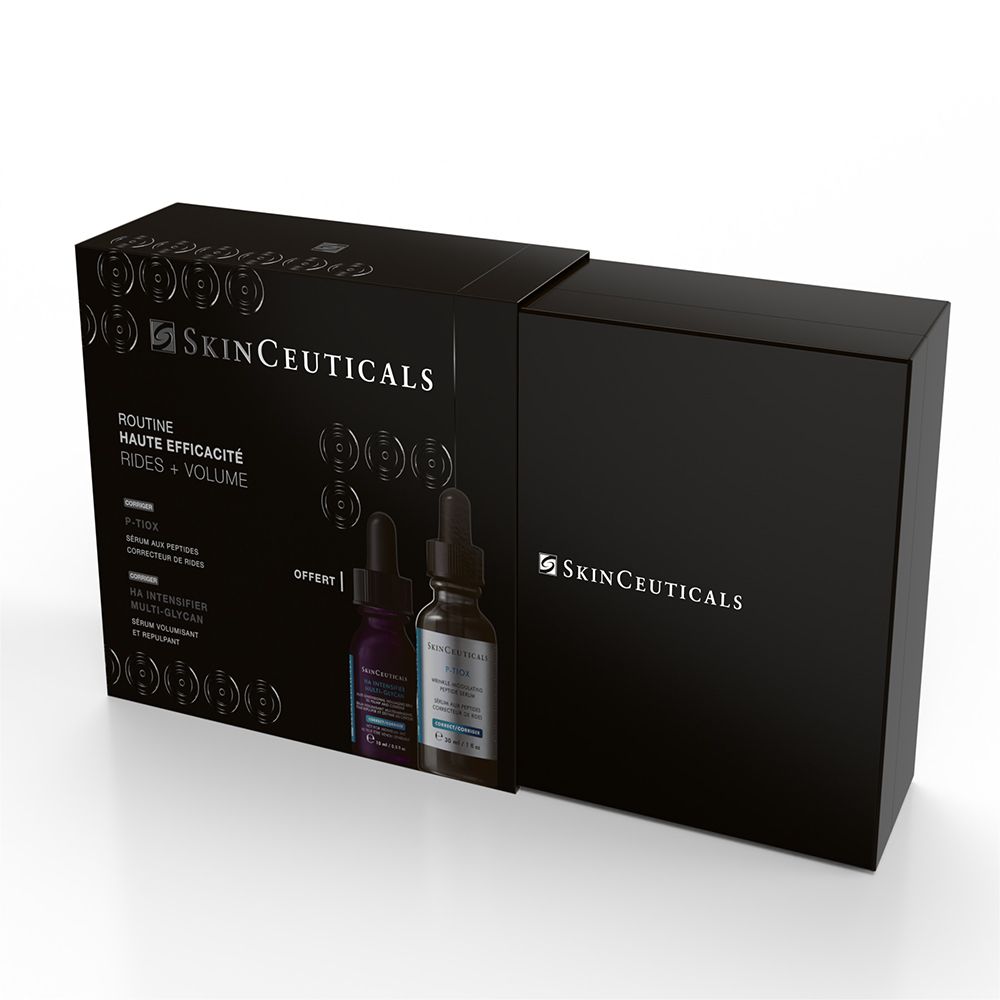 Coffret SKINCEUTICALS ouvert. Deux flacons visibles. Logo et nom du produit. Boîte noire.
