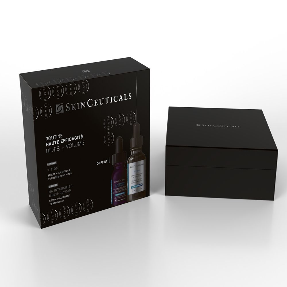 Coffret SKINCEUTICALS ouvert. Deux flacons et une boîte séparée. Boîte noire.