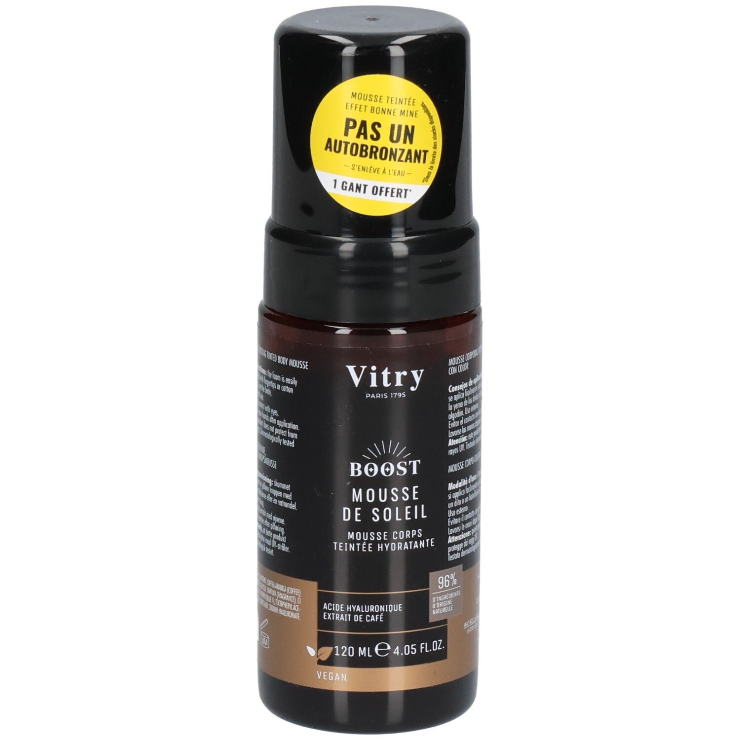 Flacon marron, bouchon noir. Autocollant: 'PAS UN AUTOBRONZANT'. Texte: BOOST MOUSSE DE SOLEIL. 120 ml.