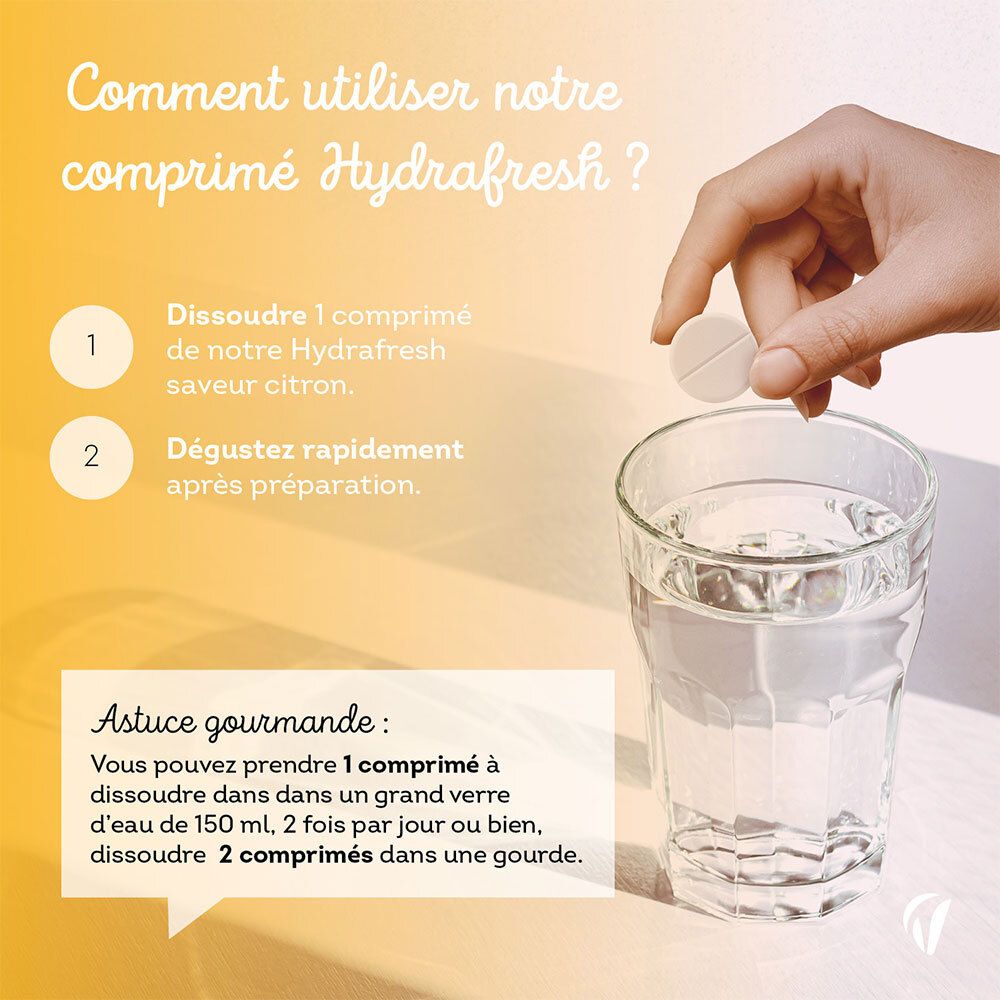 Main tenant un comprimé effervescent au-dessus d'un verre d'eau. Dissoudre dans l'eau. HYDRA FRESH, citron. Vitae.