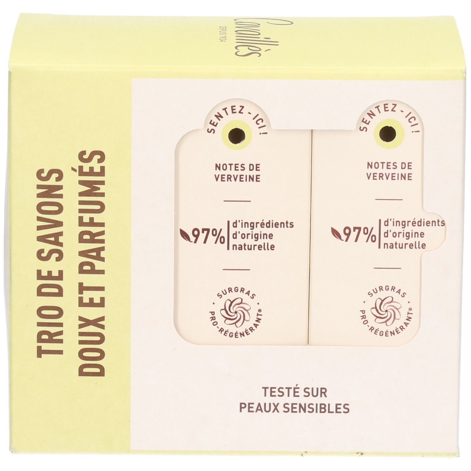 Boîte de trois savons. Fenêtre révélant deux savons. Texte: Trio de Savons Doux et Parfumés. Testé sur peaux sensibles.