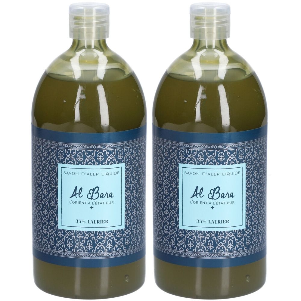 Deux bouteilles de liquide verdâtre. Les étiquettes indiquent "SAVON D'ALEP LIQUIDE", "Al Bara" et "35% LAURIER".