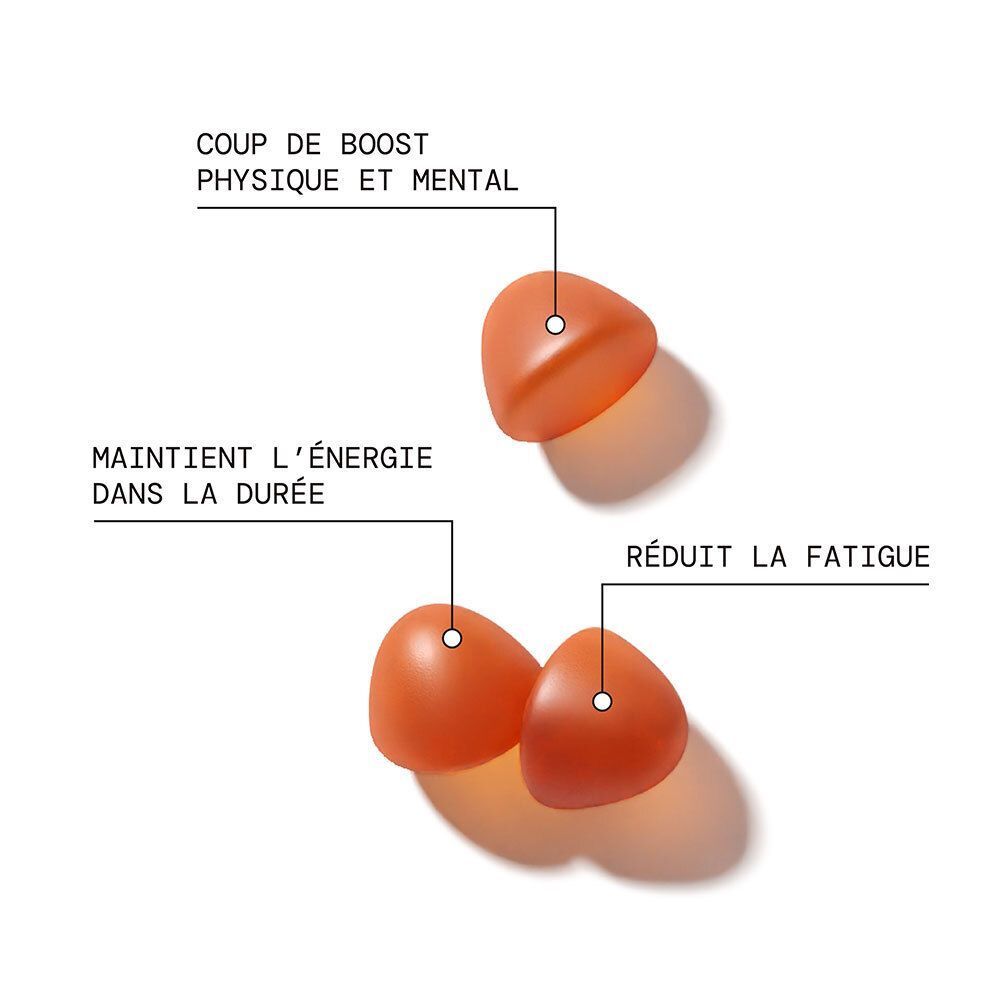 Trois gummies triangulaires oranges. Inscriptions : Réduit la fatigue, maintient l'énergie, coup de boost.