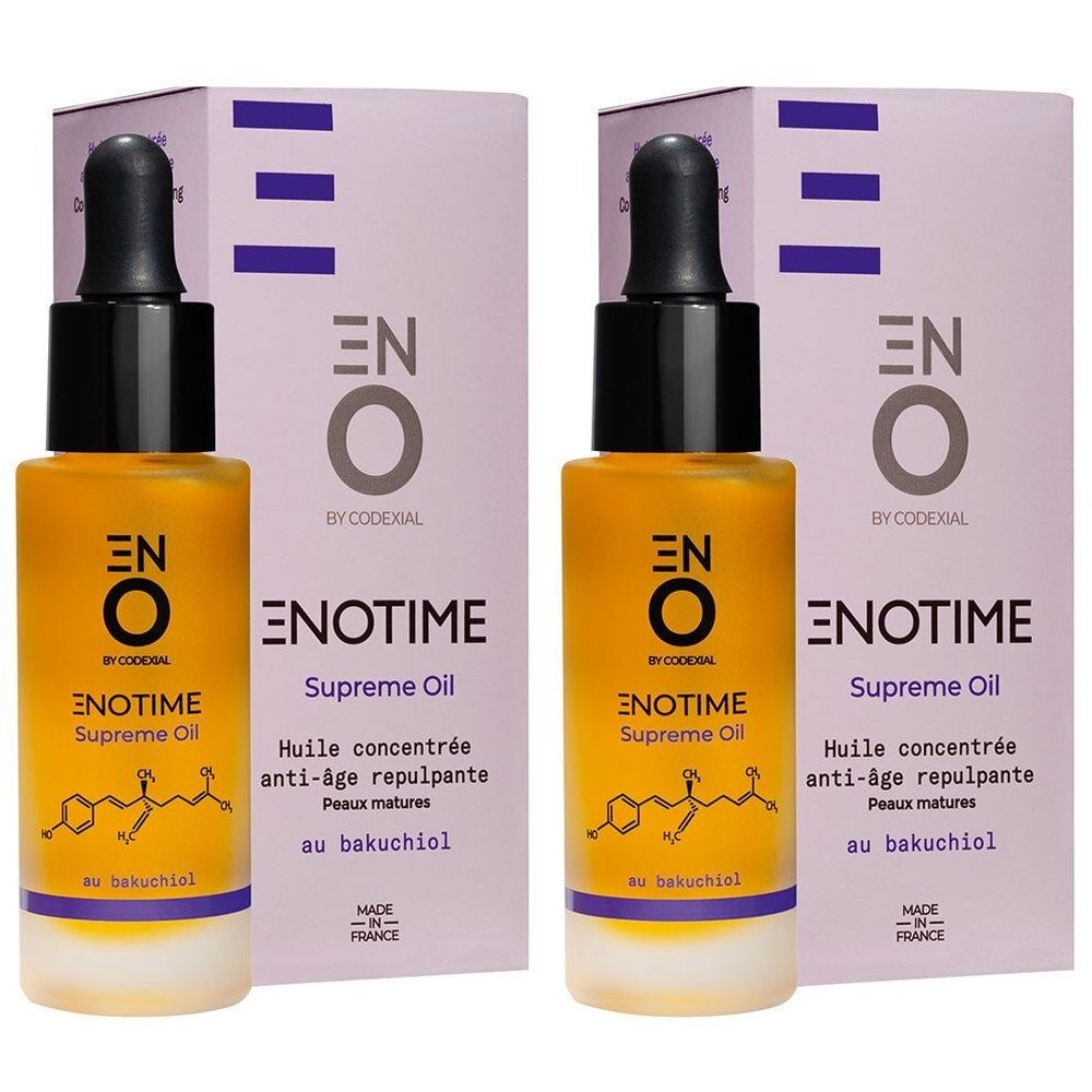 Deux flacons d'Enotime Supreme Oil avec emballage. Liquide jaune dans des flacons en verre avec bouchon noir et pipette. Emballage avec accents violets.