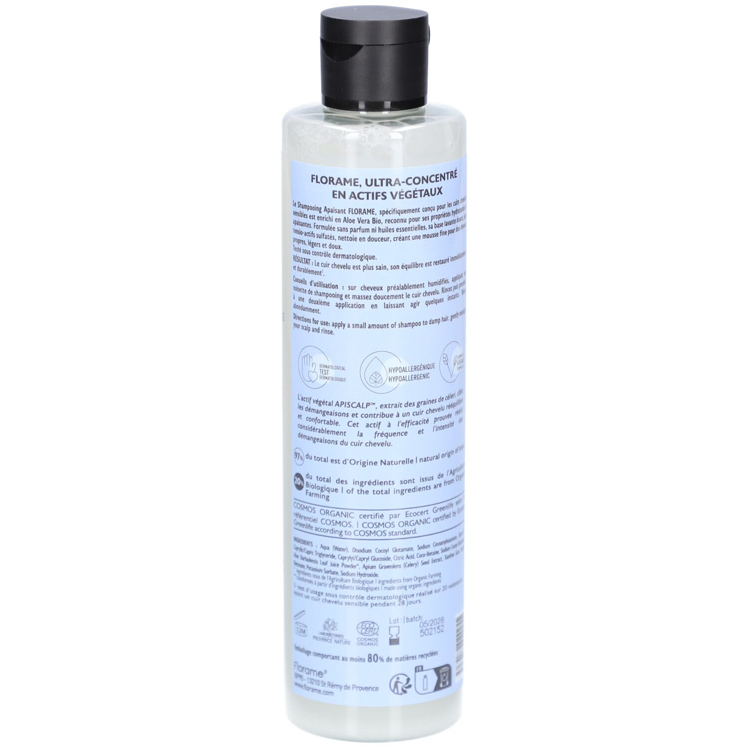 Dos du flacon de shampooing FLORAME. Informations textuelles sur étiquette blanche et bleue. Flacon transparent, bouchon noir.