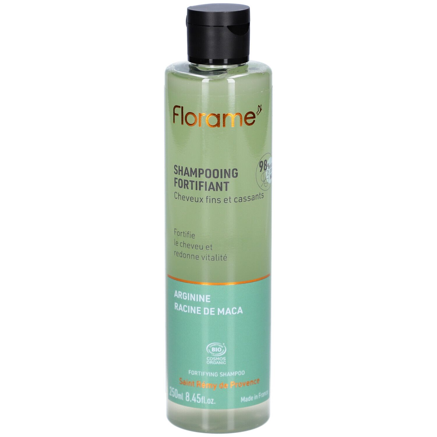 Flacon de shampooing vert avec bouchon noir. Inscriptions: FLORAME, Shampooing Fortifiant, Arginine, Racine de Maca. Certification bio.