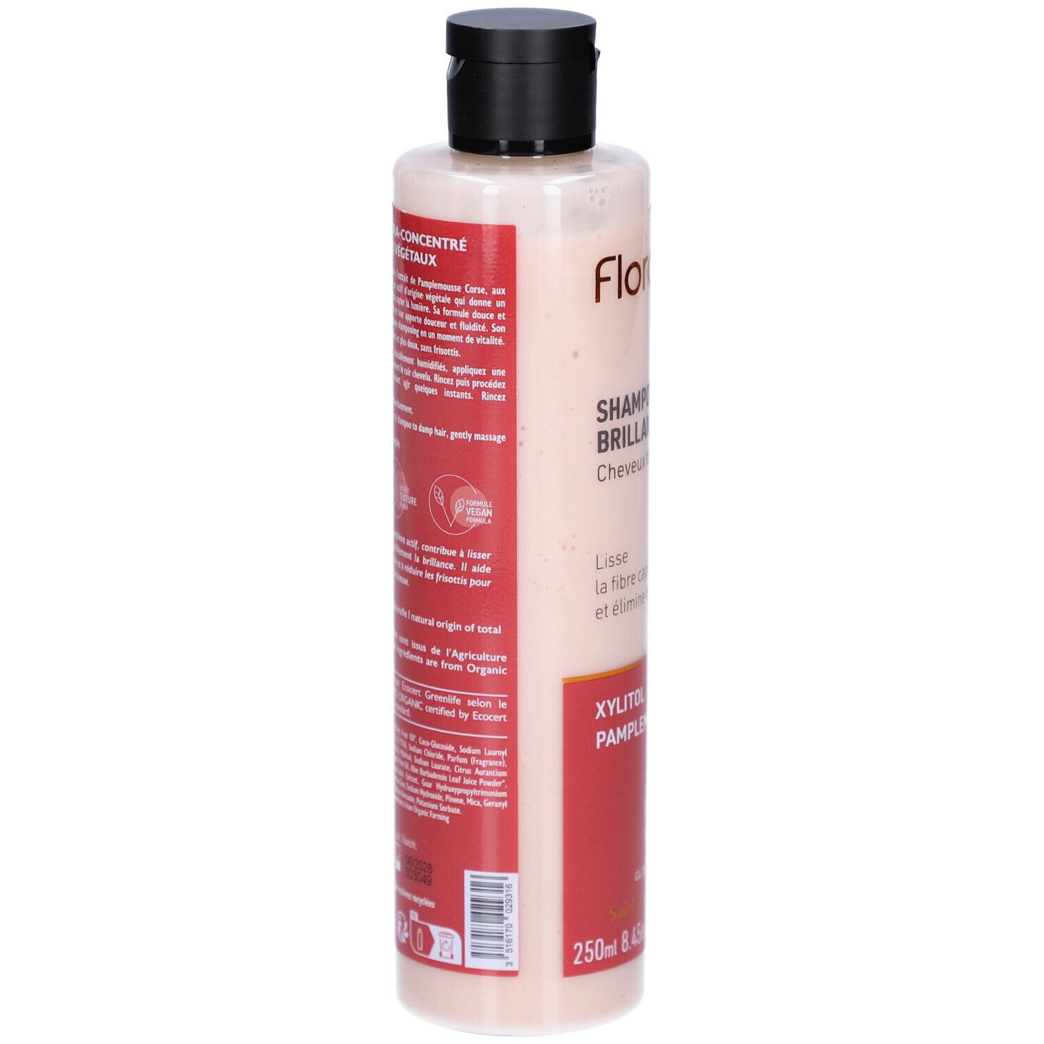 Flacon de shampooing, vue latérale. Zone d'étiquette rouge avec texte. Logo FLORAME. Bouchon noir. Flacon transparent.