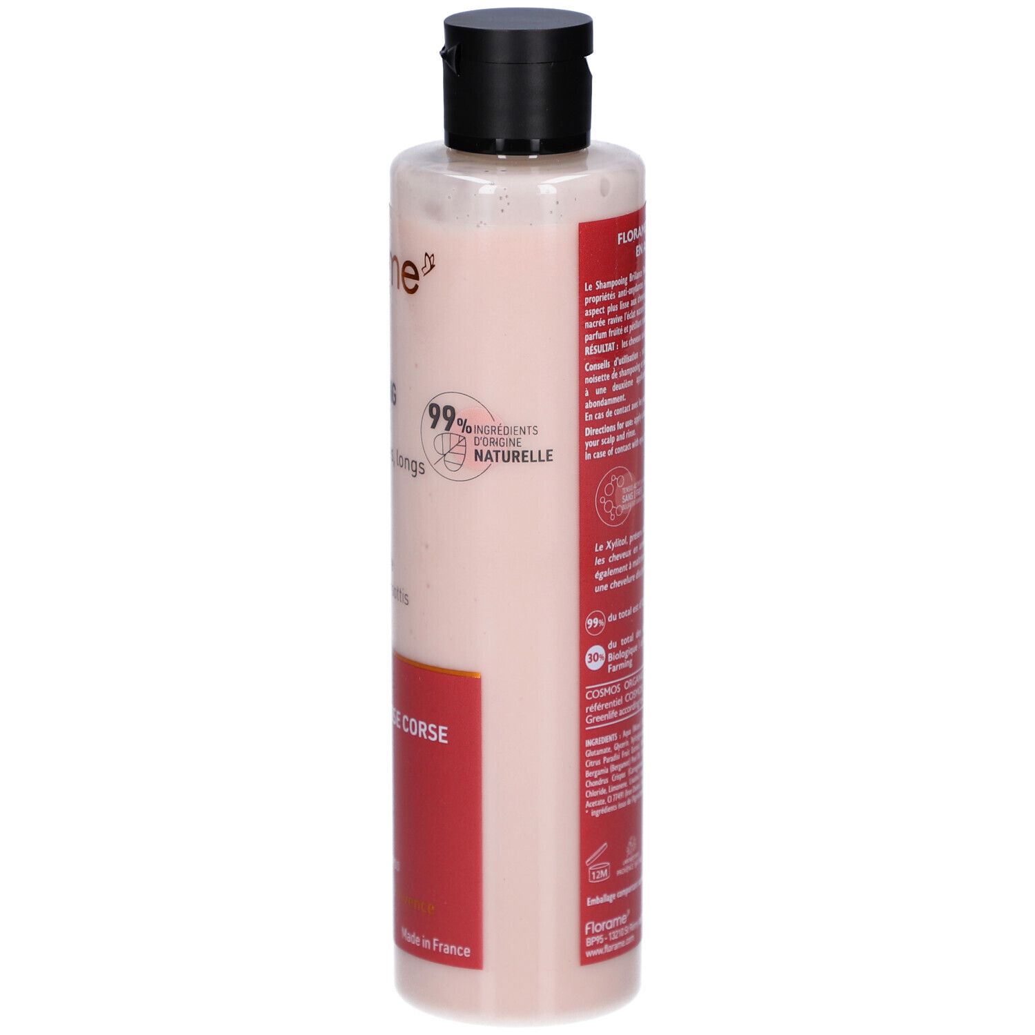 Flacon de shampooing, vue arrière. Zone d'étiquette rouge avec texte. Logo FLORAME. Bouchon noir. Flacon transparent.