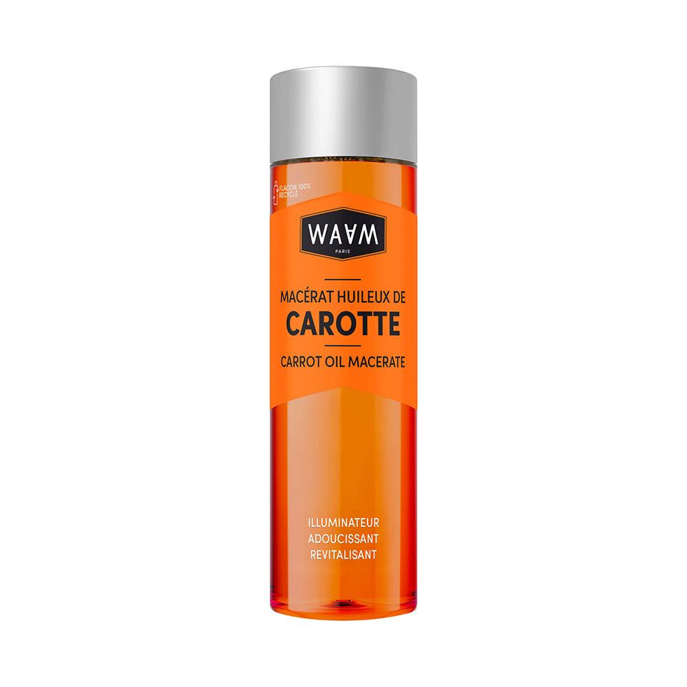 Flacon en verre orange avec bouchon argenté, contenant de l'huile de carotte.